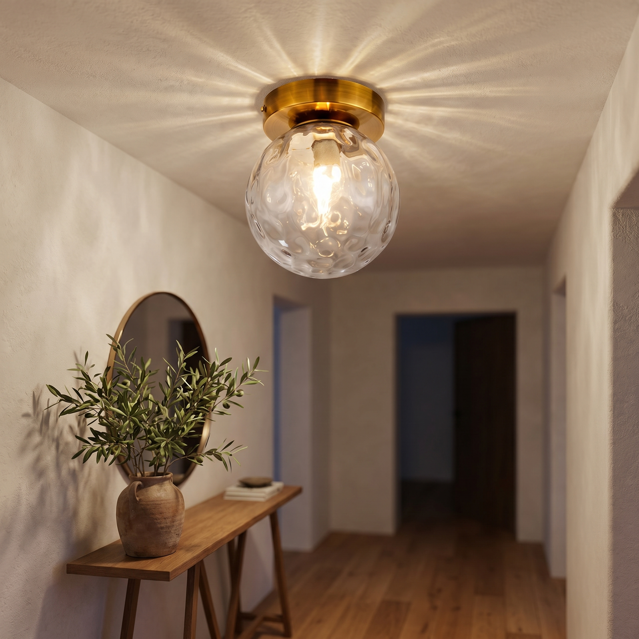 Rugiada Dorata flush mount lit in a warm Italian-inspired entryway with dappled light scatter