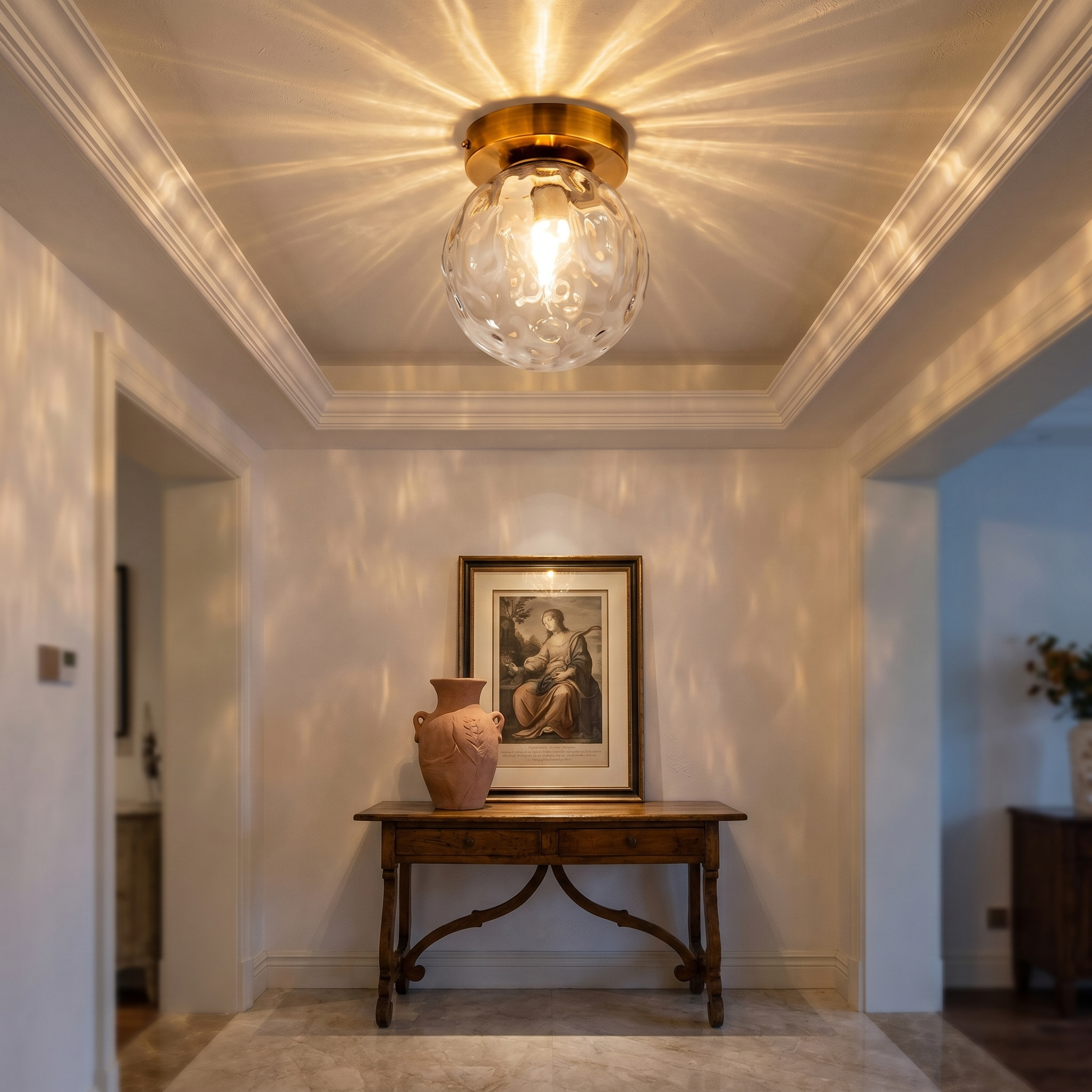 Rugiada Dorata flush mount lit on a tray ceiling in an elegant Italian-inspired foyer