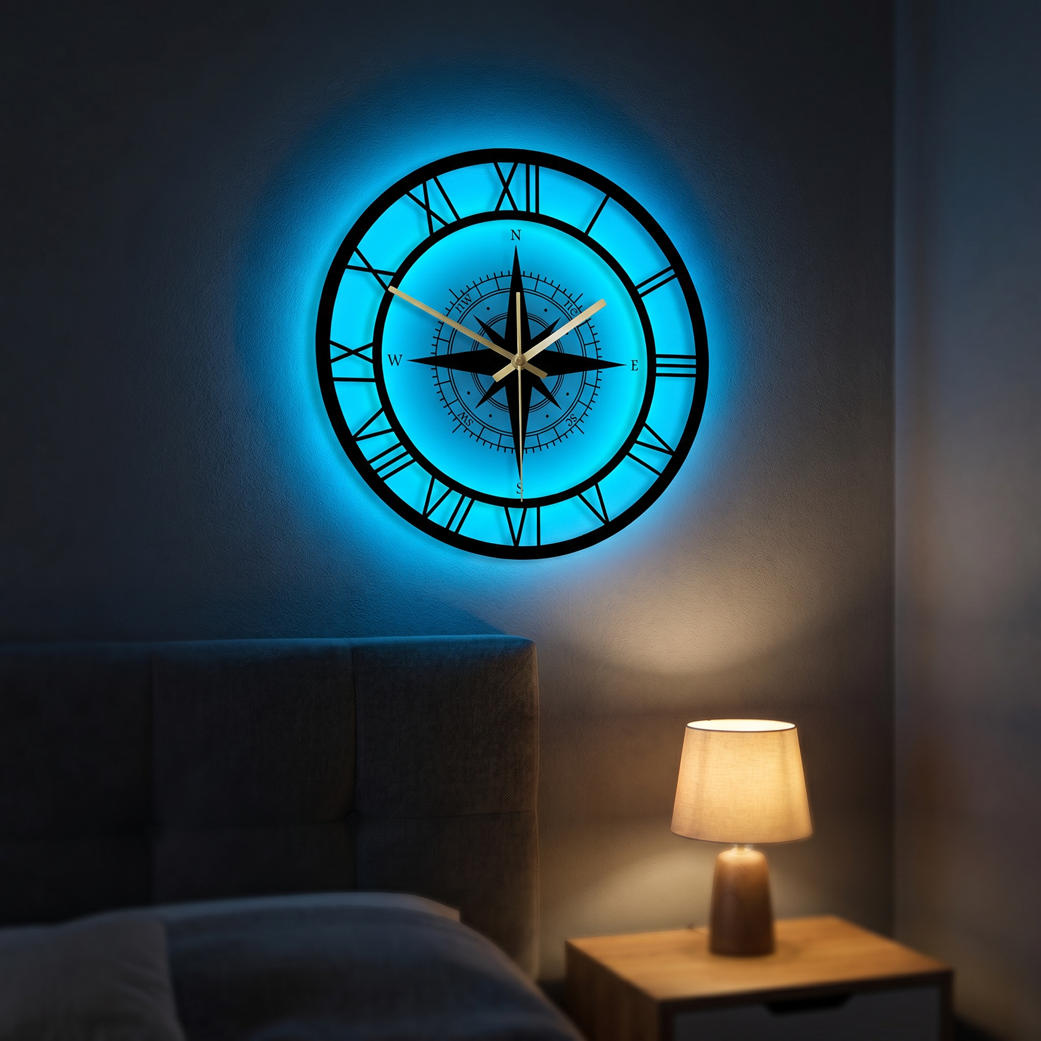 LED compass wall clock glowing ocean-blue on a bedroom wall at night