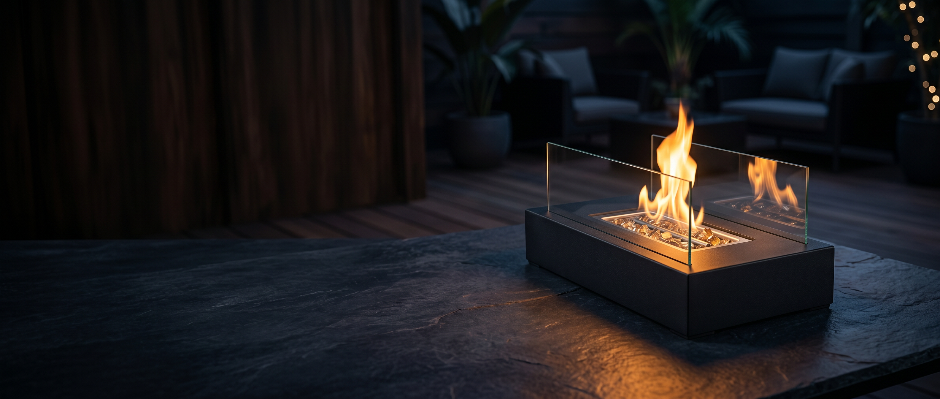 Lume Vivo tabletop fire pit banner — real flame on a dark moody patio