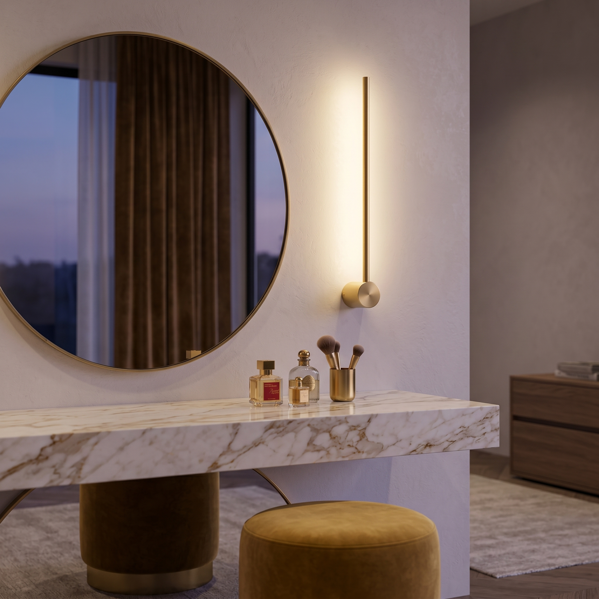 Filo di Luce golden linear sconce beside a vanity mirror