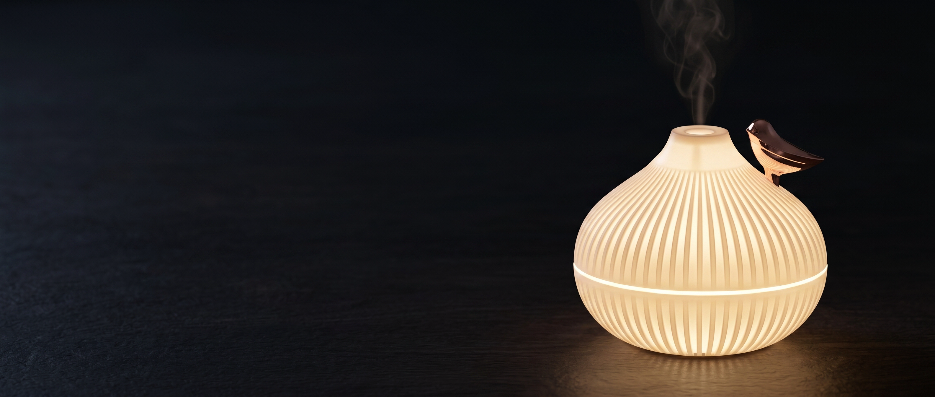 Nuvola mist humidifier glowing warm — ambiance banner