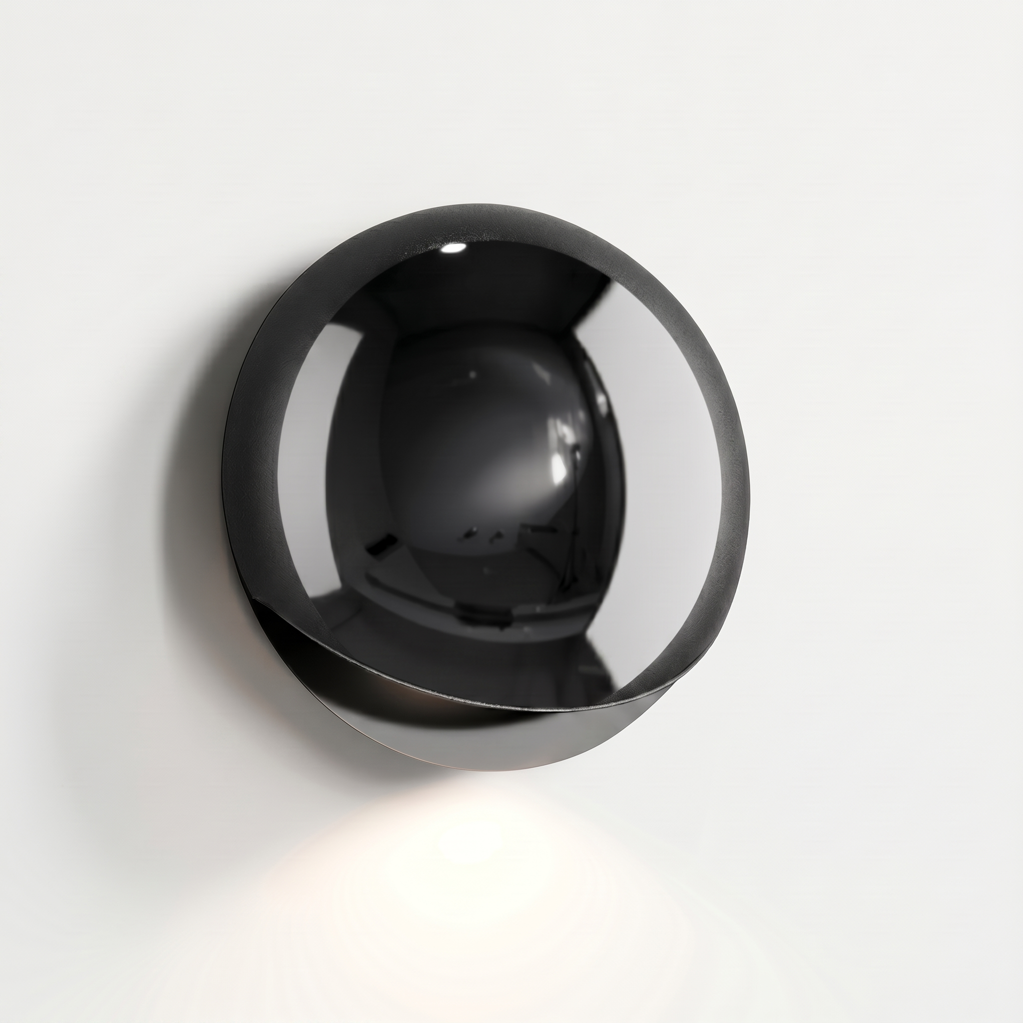 Eclissi outdoor wall light in Pearl Black — studio hero
