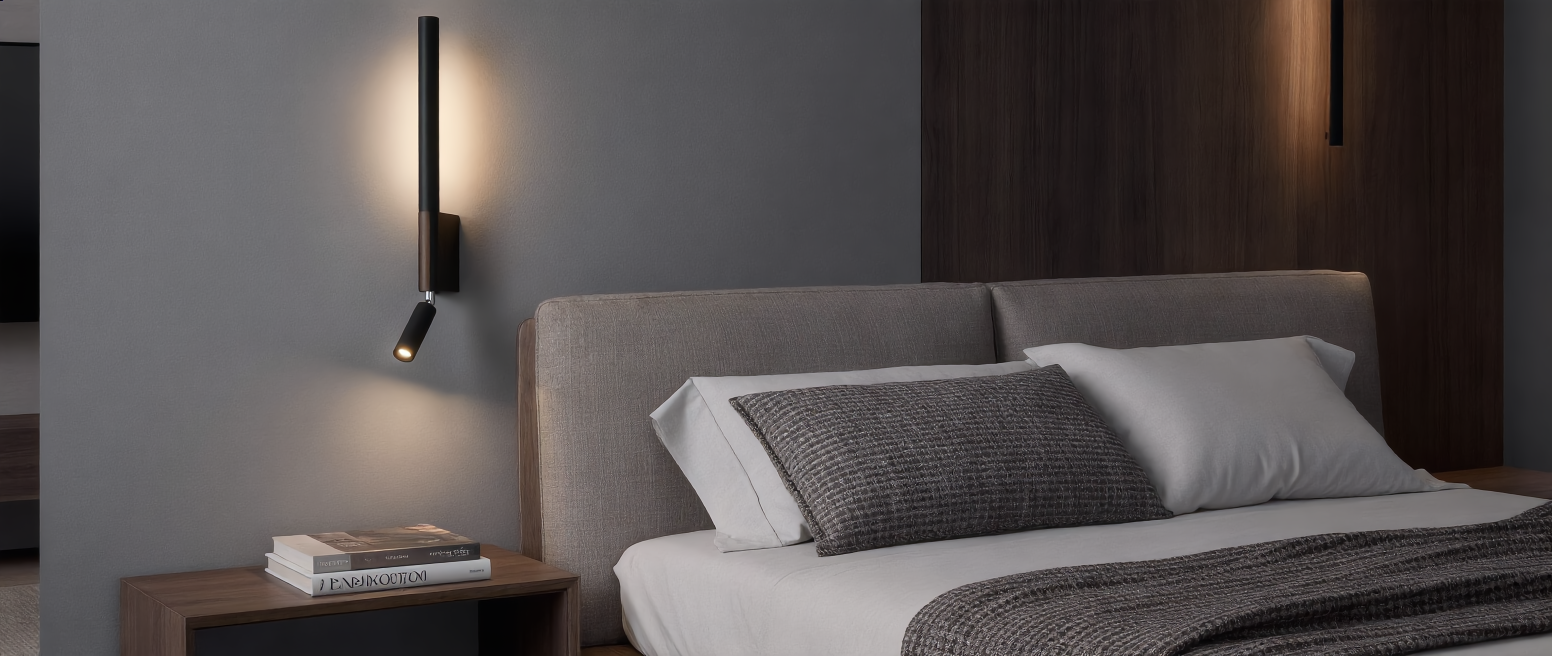 Carezza Notturna bedside reading wall light — black, warm glow in a luxurious master bedroom (banner)