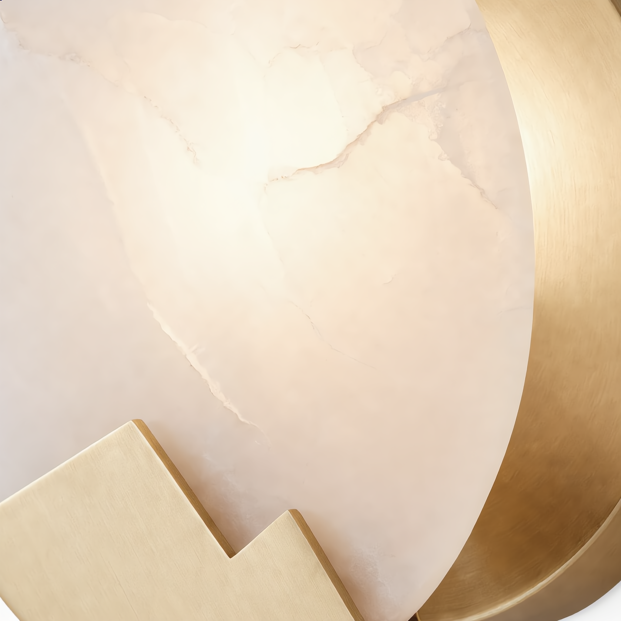 Close-up of the Luna d'Alabastro sconce glowing alabaster veining and copper mountain detail