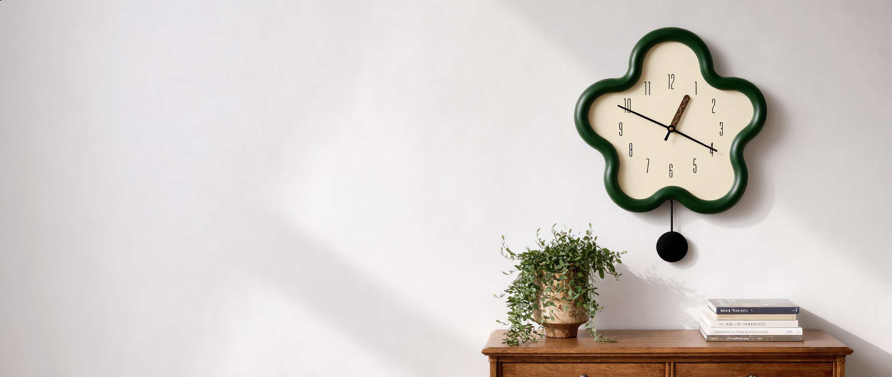 Fiorella flower pendulum wall clock styled on a wall — editorial banner