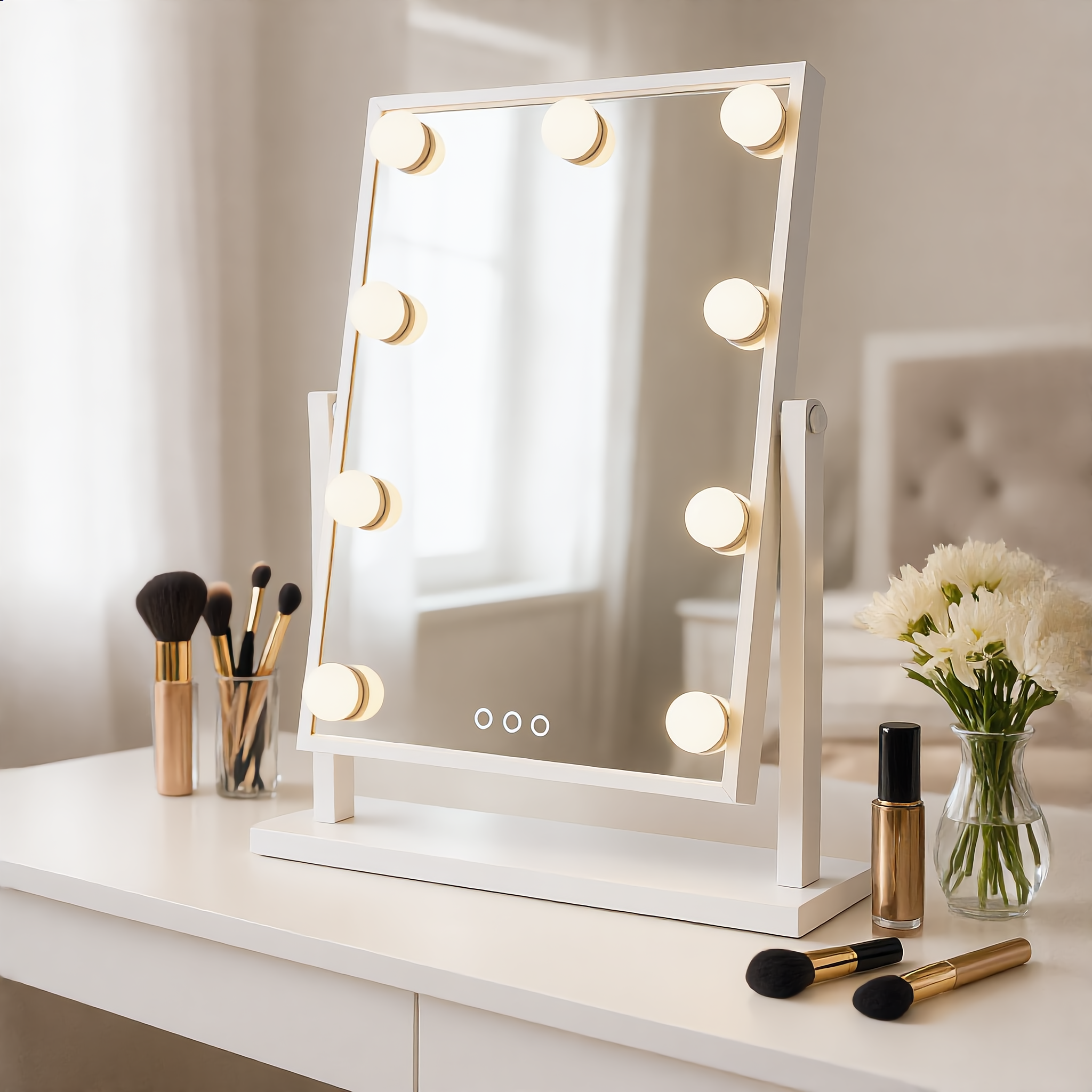 White Hollywood vanity mirror with lit bulbs on a bright dressing table