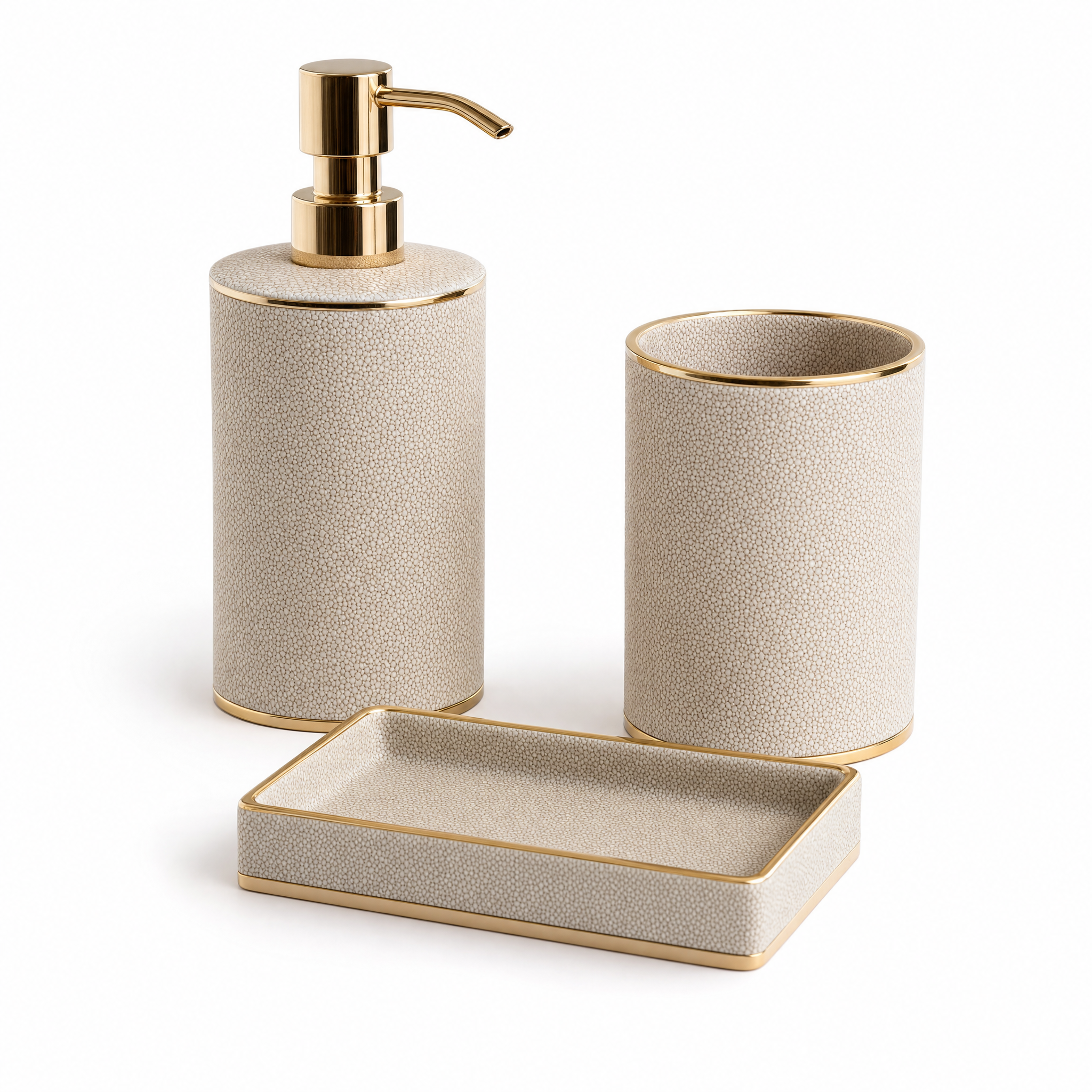 Lusso champagne ceramic bathroom set with gold accents on white