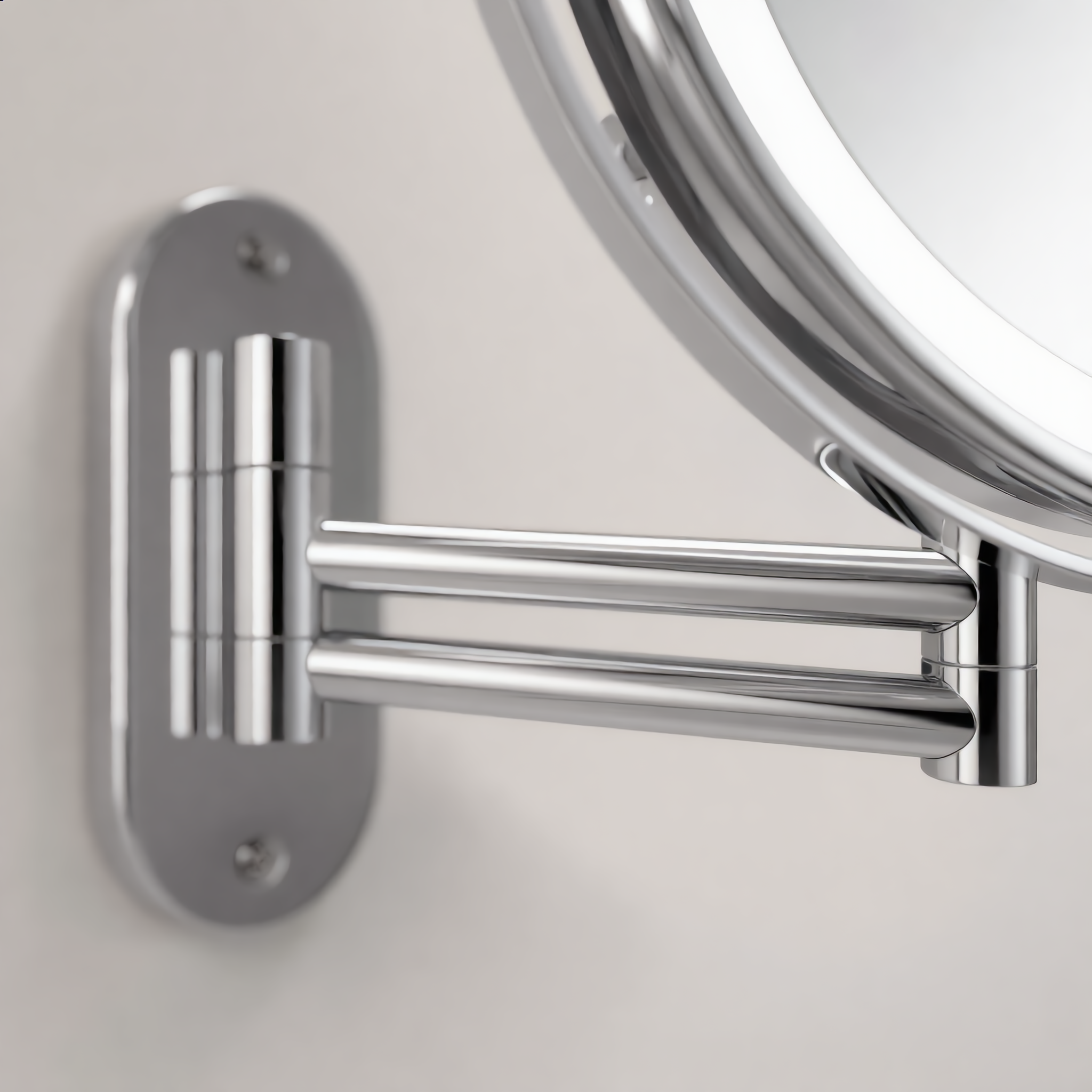 Close-up of the chrome double-jointed extending arm and wall plate