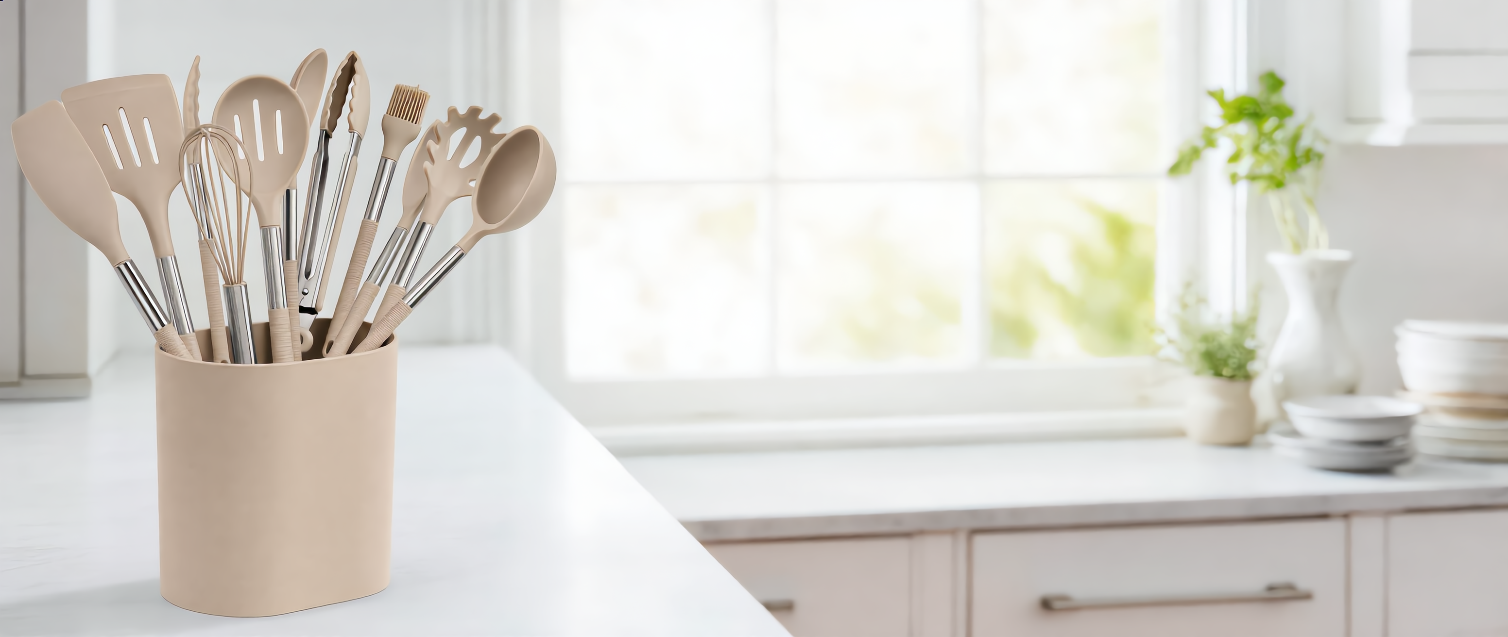 Nordica Silicone Utensil Set in khaki in a bright Nordic kitchen, wide banner