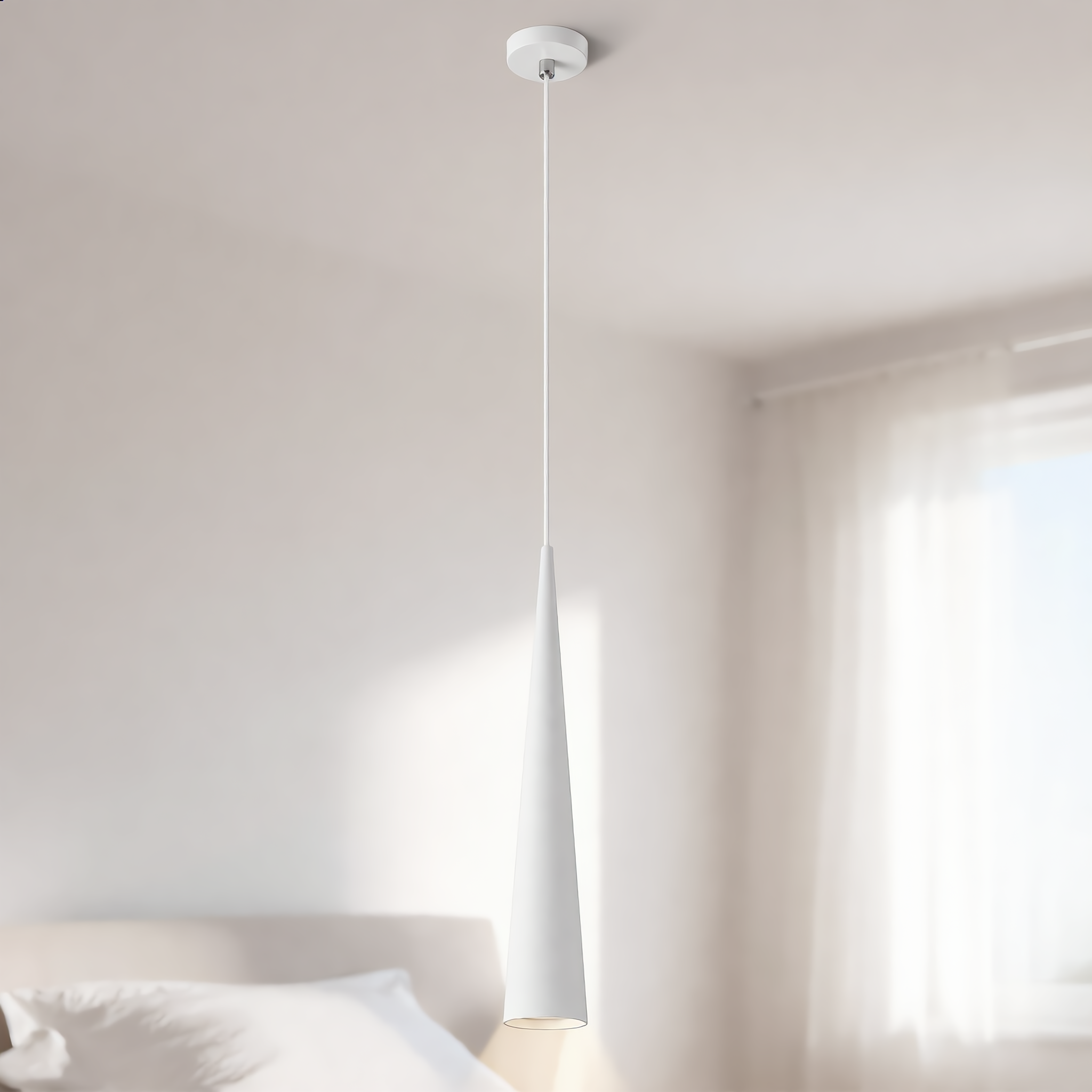 Cometa white cone pendant in a minimalist bedroom