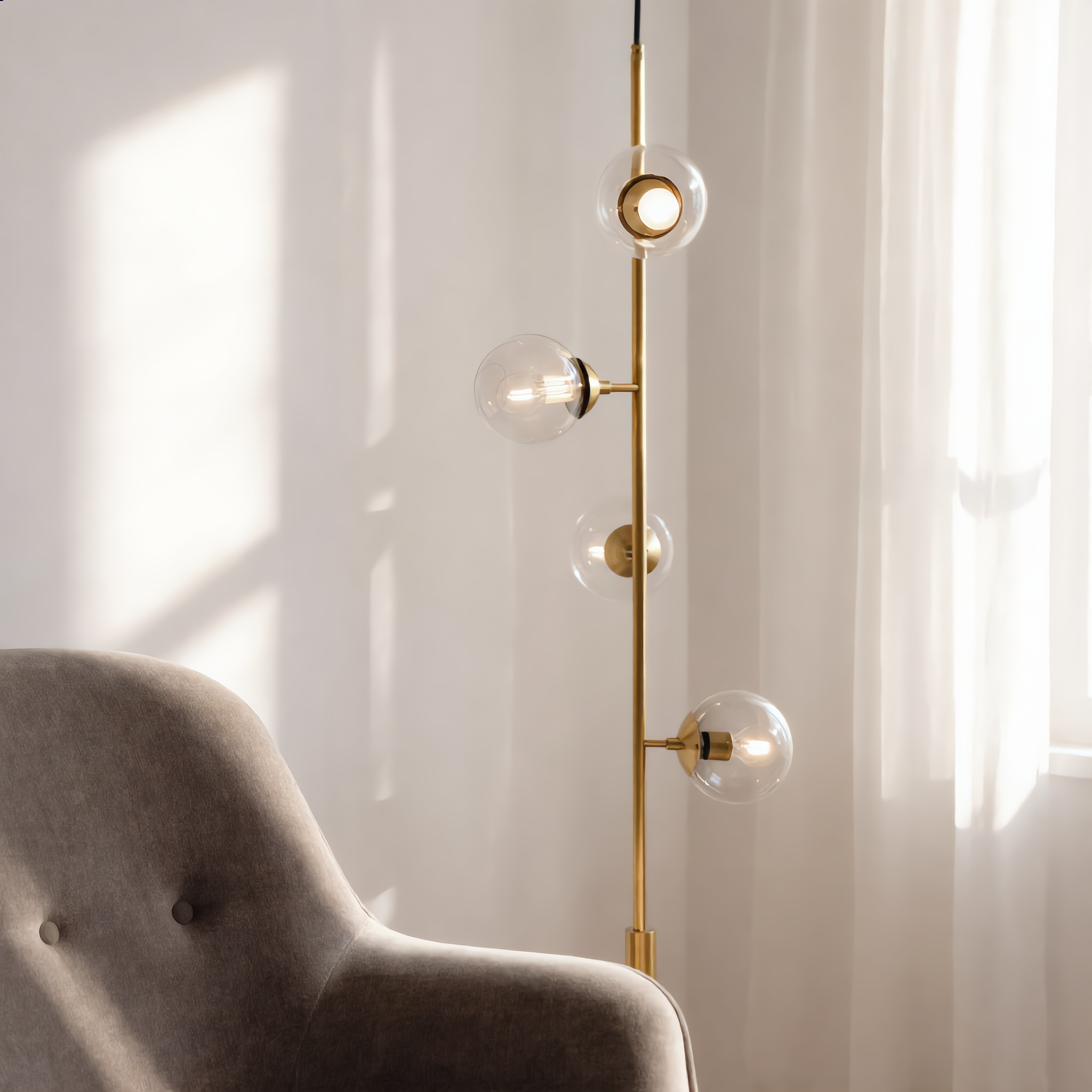 Costellazione gold vertical pendant in a bright reading corner
