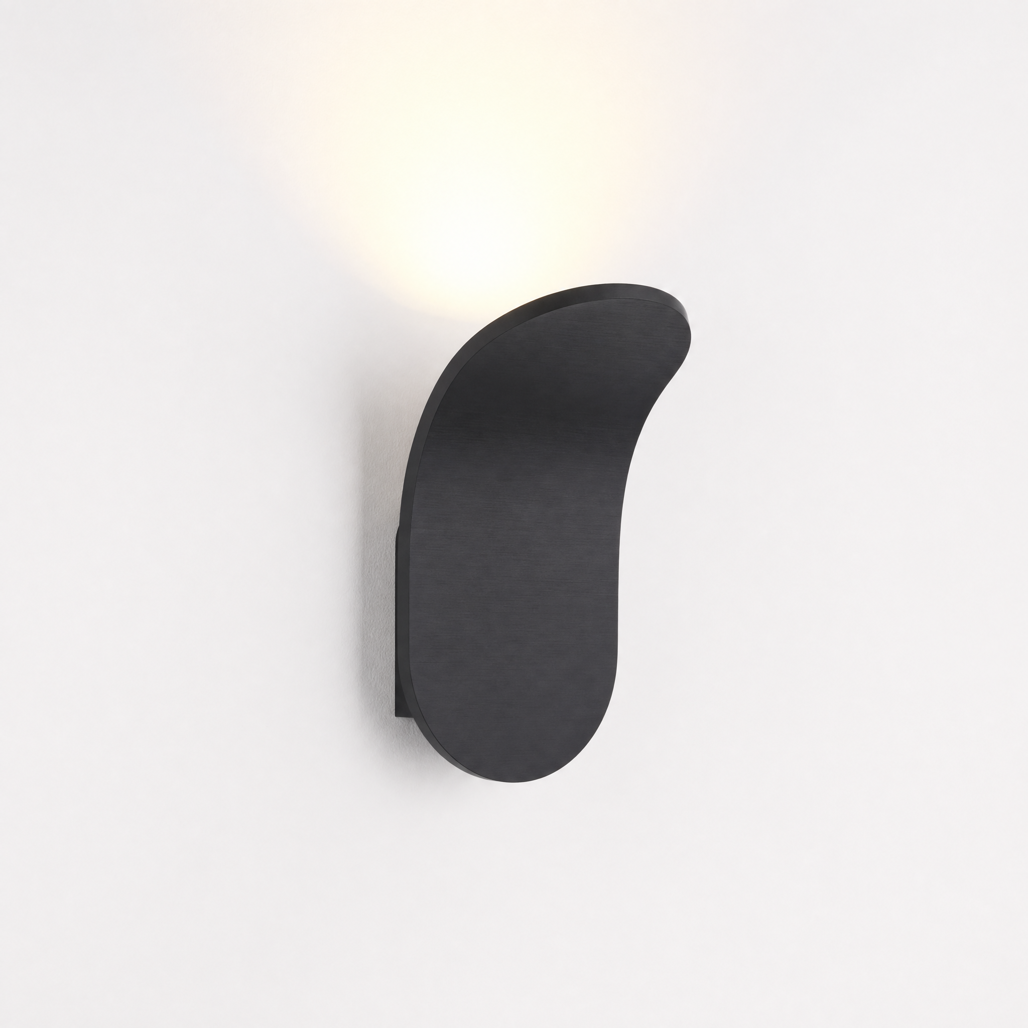 Matte black curved wall sconce neutral white glow