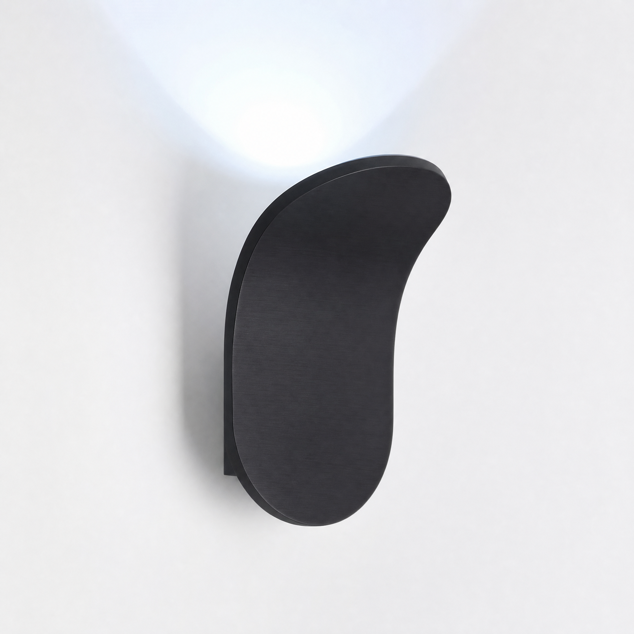 Matte black curved wall sconce cool white glow