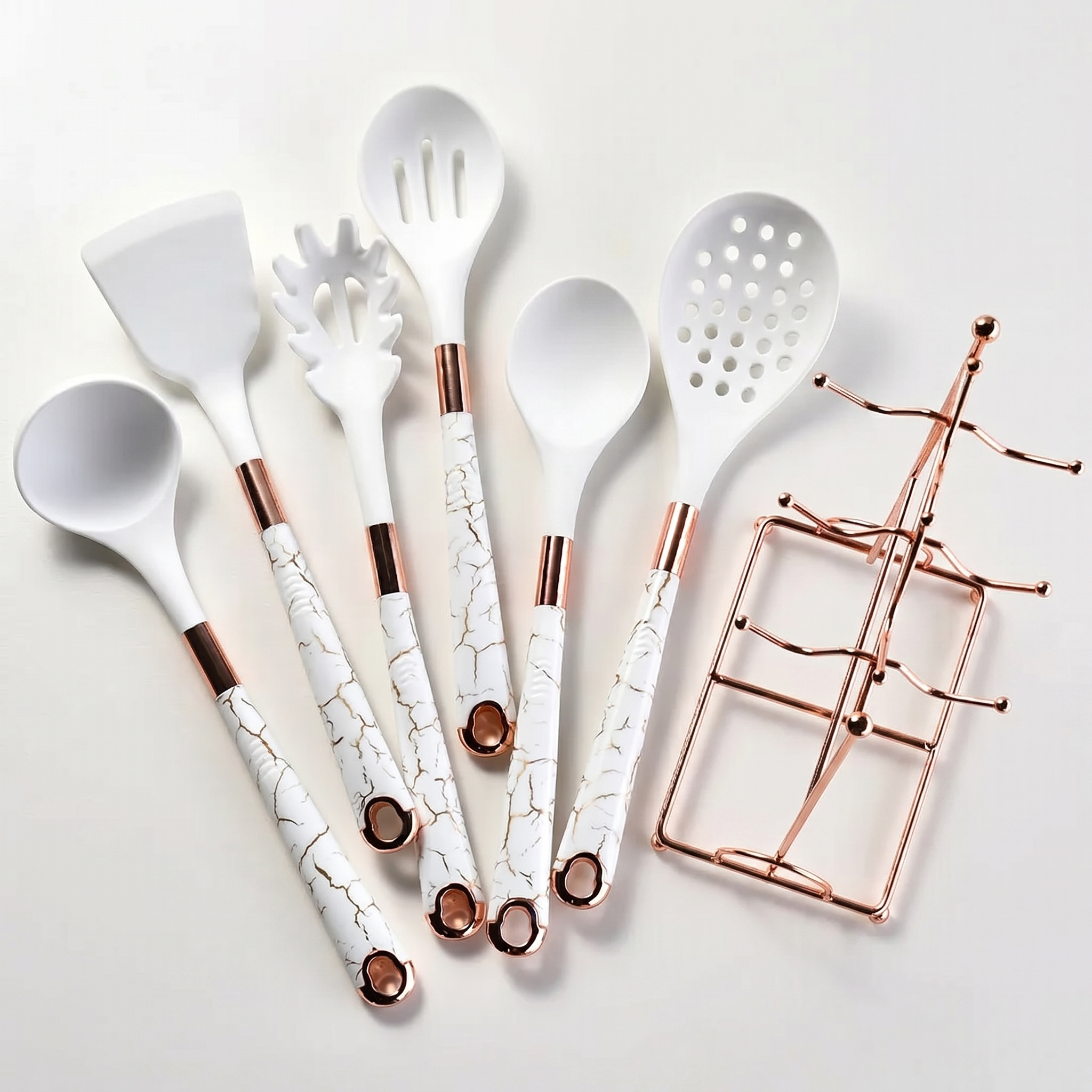 Marmo rose gold kitchen utensil set with white marble handles on white background