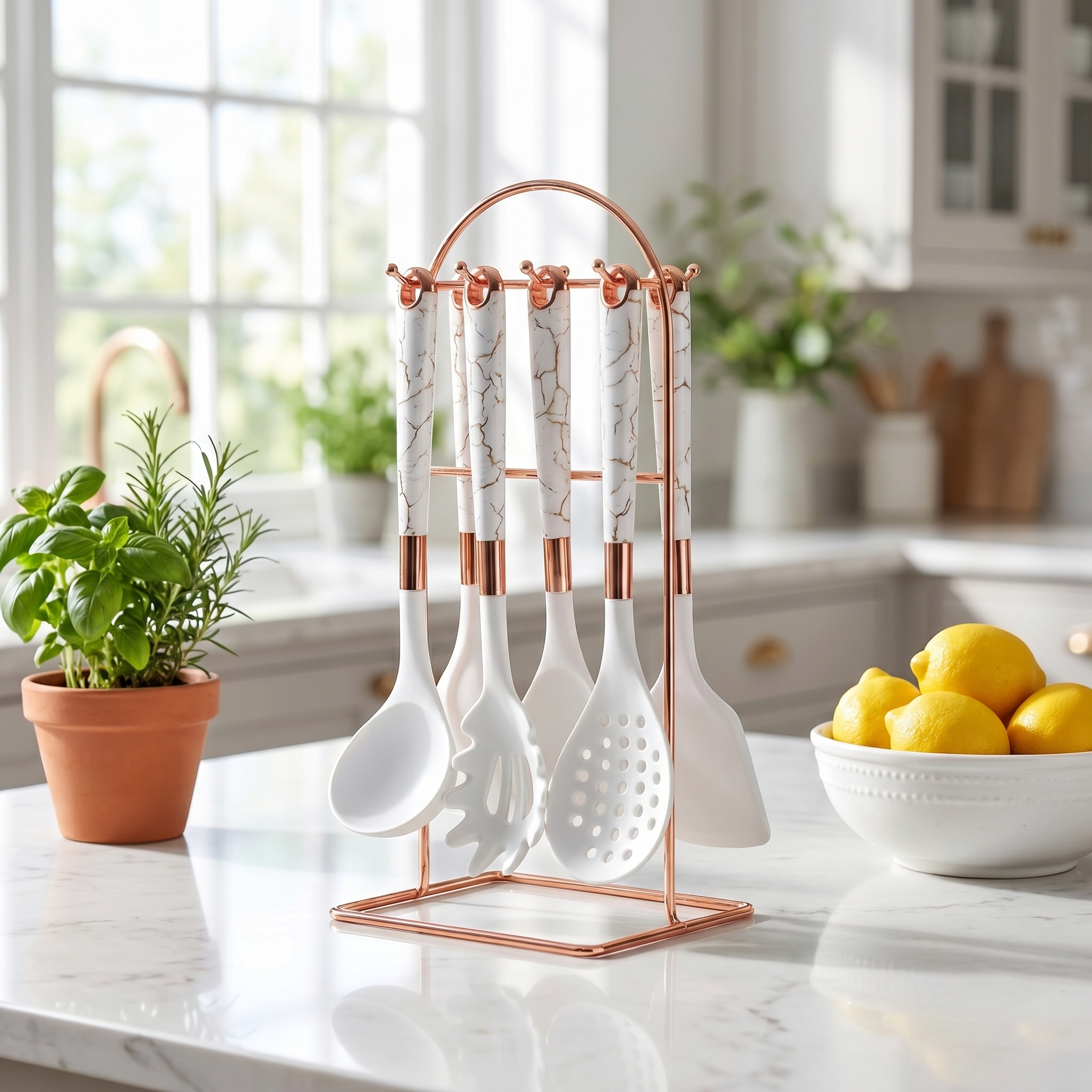 White Marmo utensil set on rose gold stand on a bright marble kitchen counter