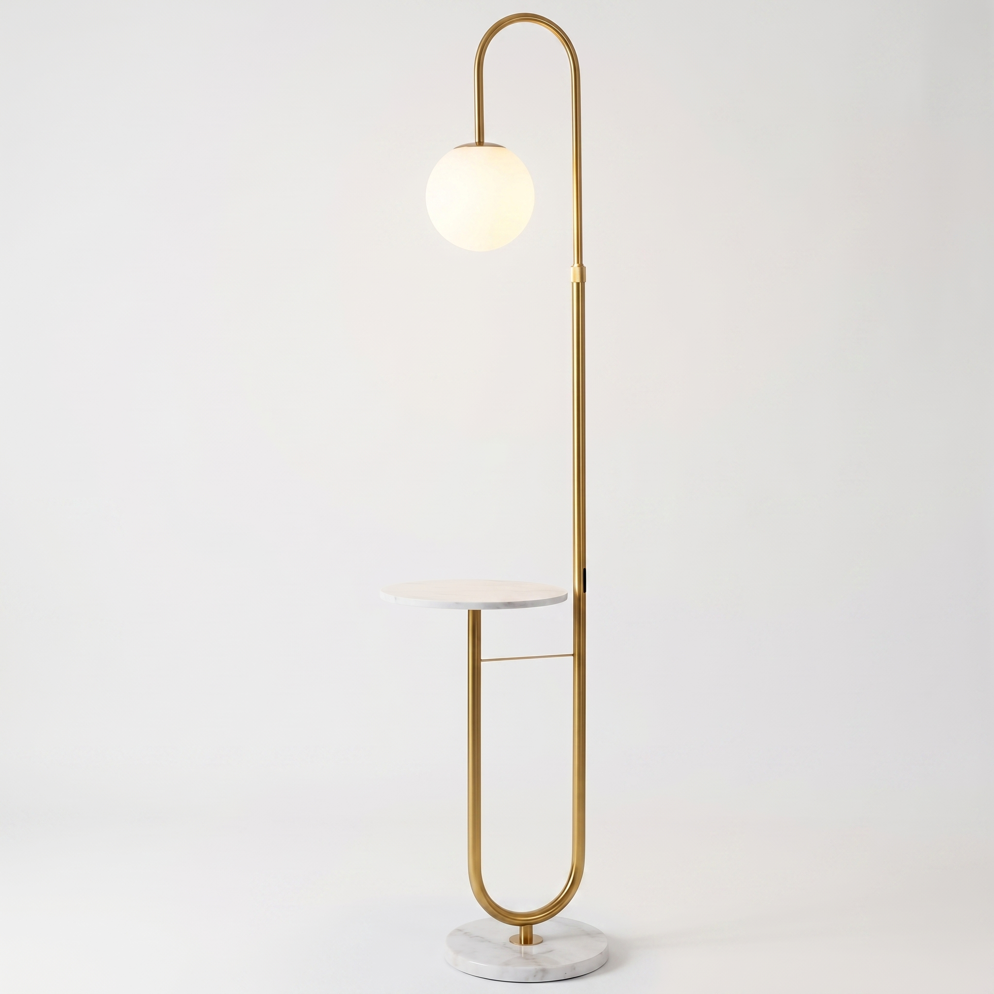Orbita gold globe floor lamp with white marble side table on white background