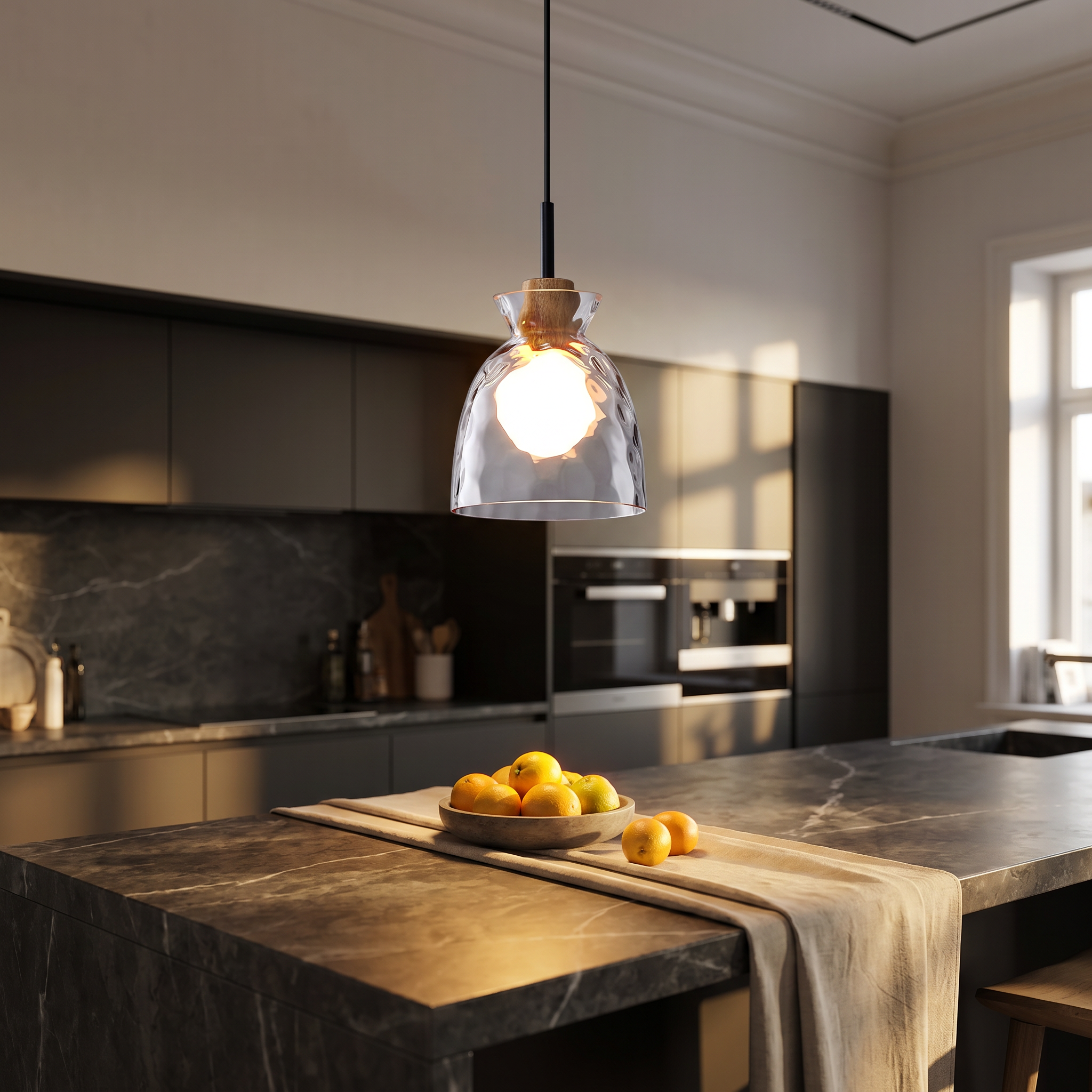 Chiara bell pendant over a kitchen island