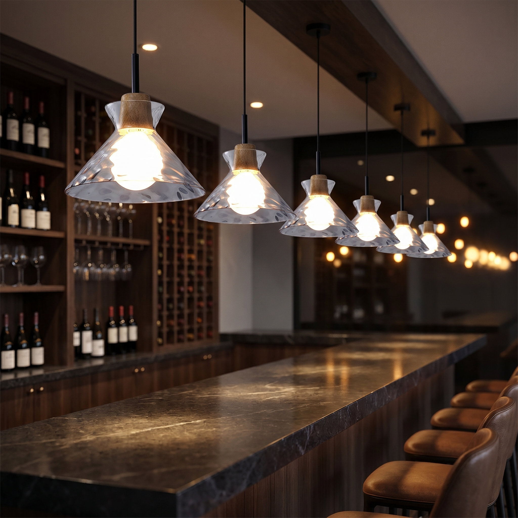 Chiara cone pendants over a bar counter