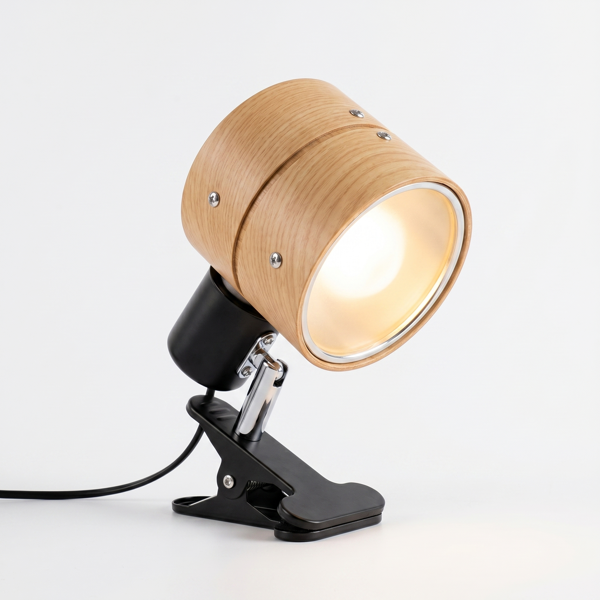 Bosco light wood clip-on reading lamp, lit, on white