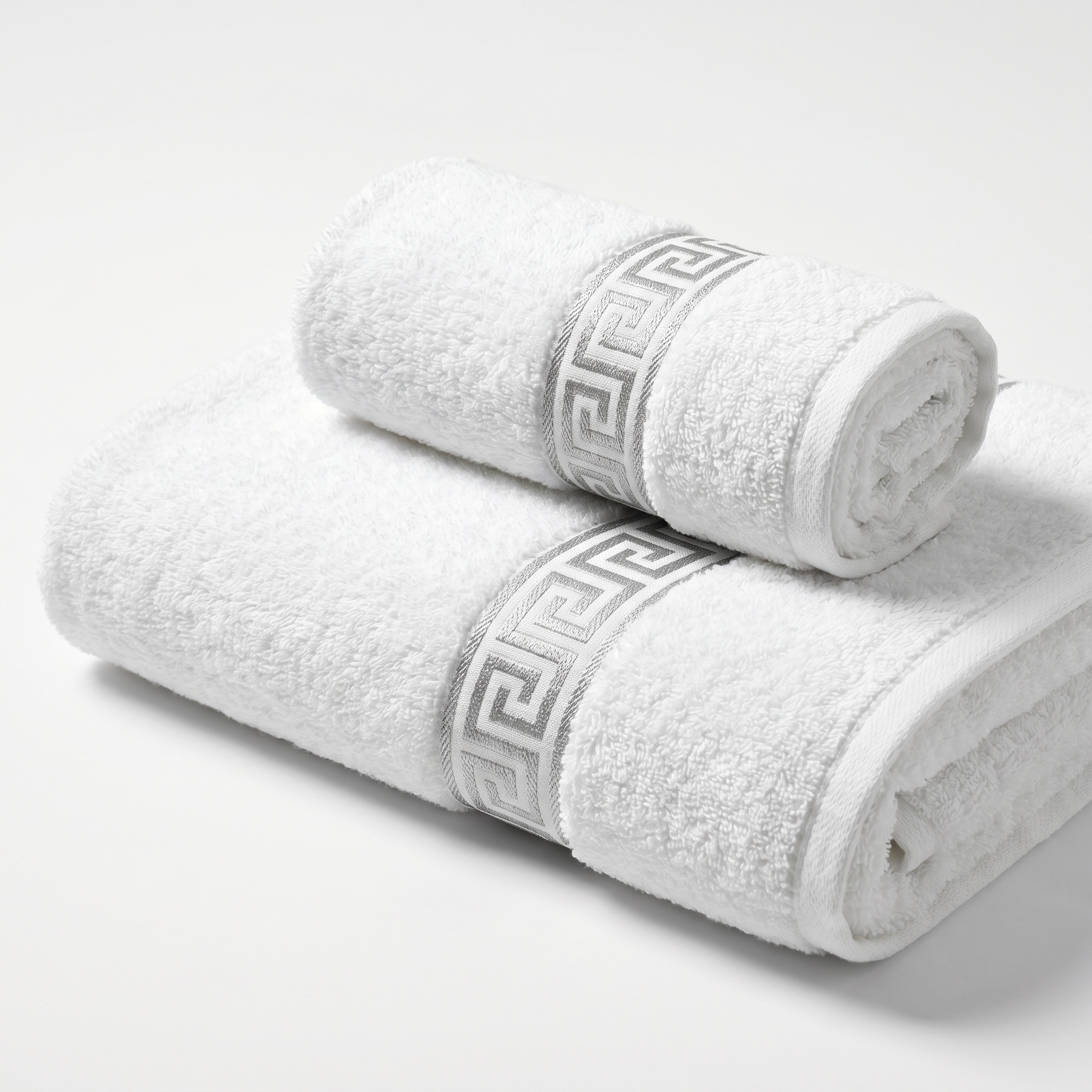Imperial White cotton towel set with silver Greek key border