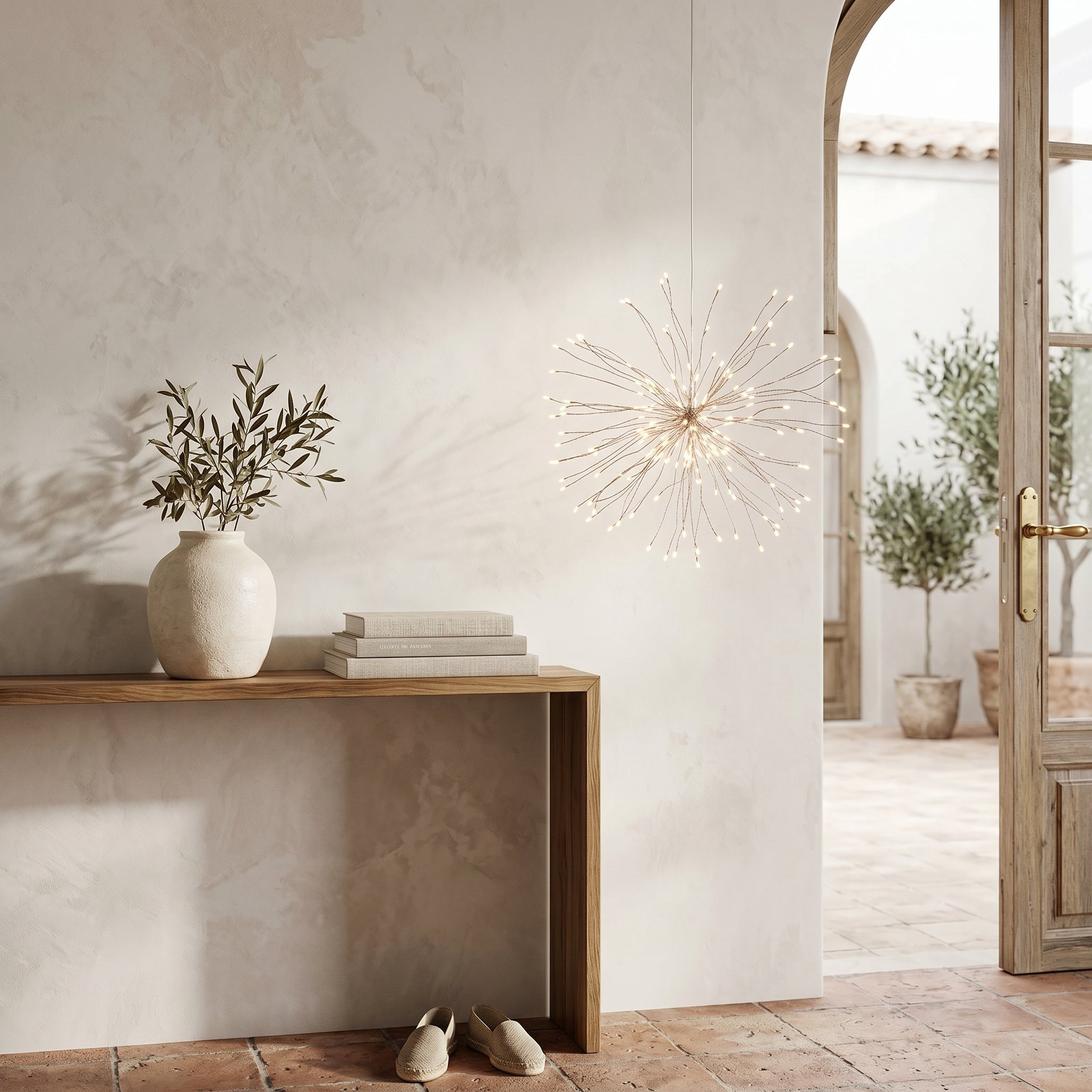 Single Scintilla starburst light beside an entryway console