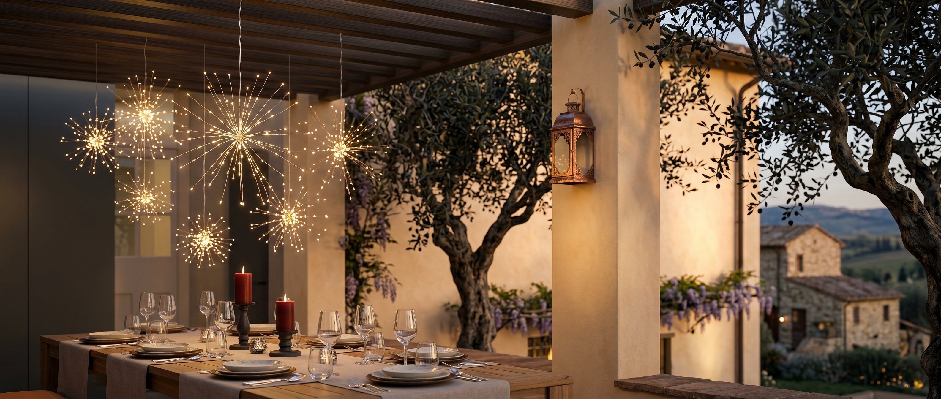 Scintilla starburst lights over a Tuscan terrace dining setting at dusk