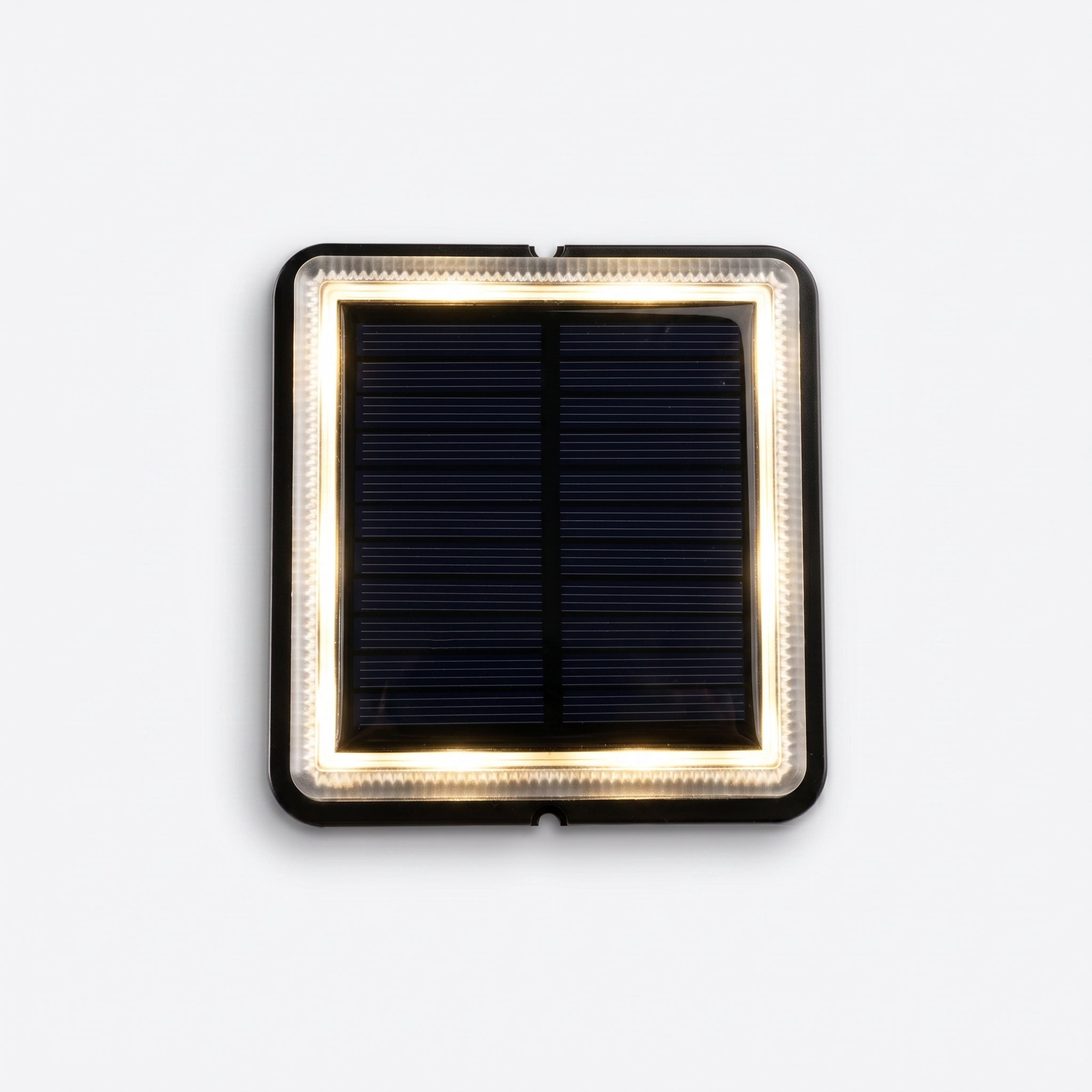 Lucciola solar ground light top view showing solar panel and LED glow