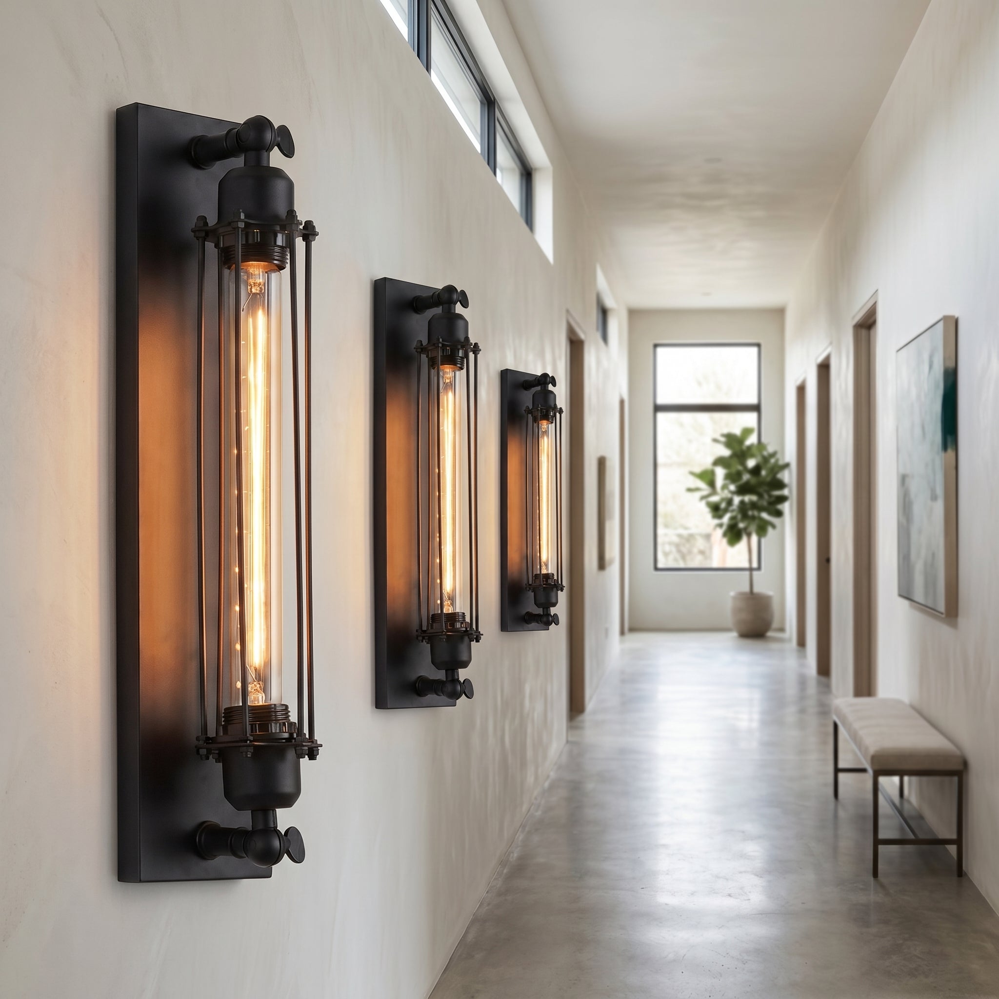 Three Ferro Antico Edison Wall Sconces lining a bright hallway