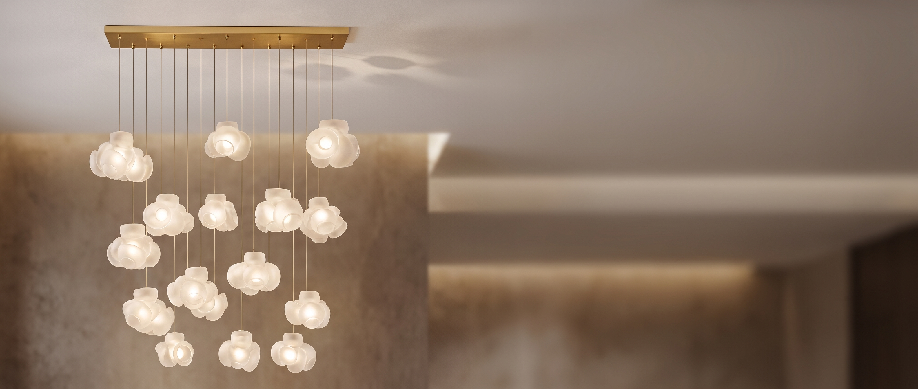 Nuvola Fiorita frosted glass bloom chandelier mounted to the ceiling in a luxury interior