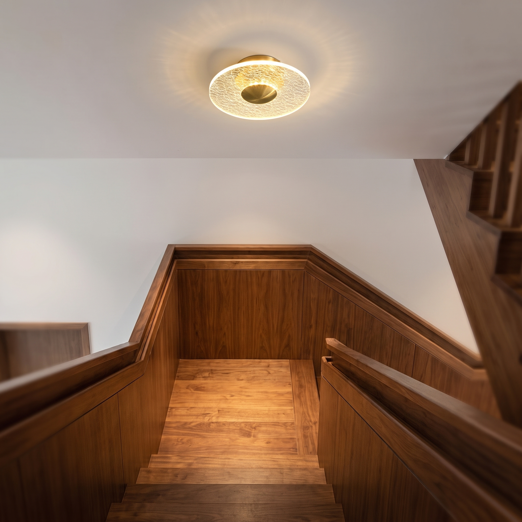 Crystal halo ceiling light over a staircase