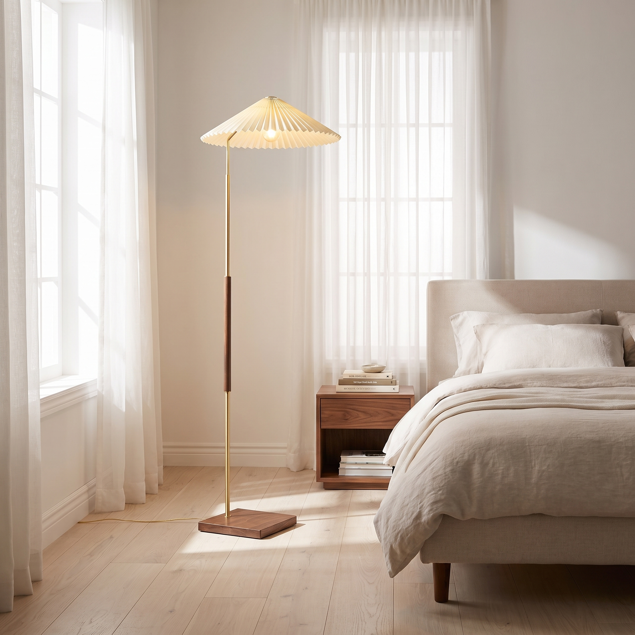 Pleated floor lamp beside a bed in a serene bedroom reading nook