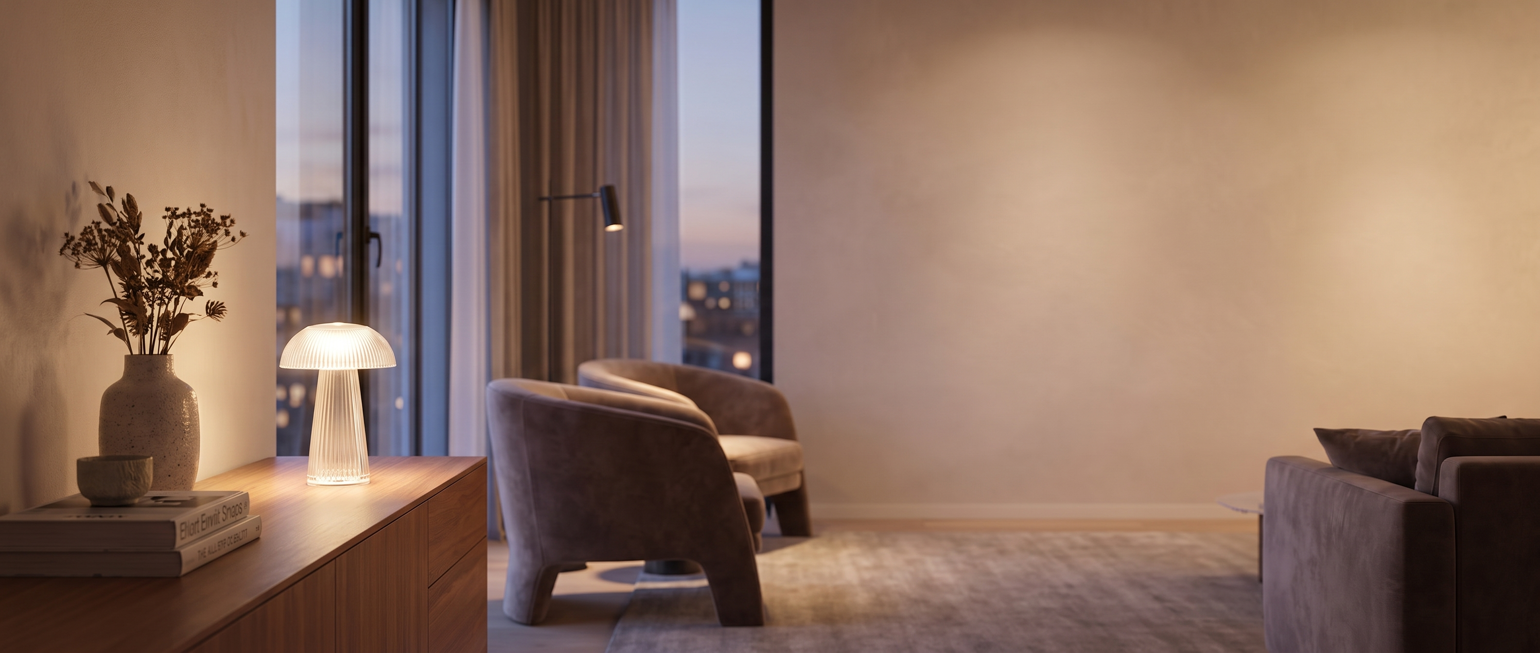 Aqualume jellyfish lamp glowing warm in a cosy living room at dusk