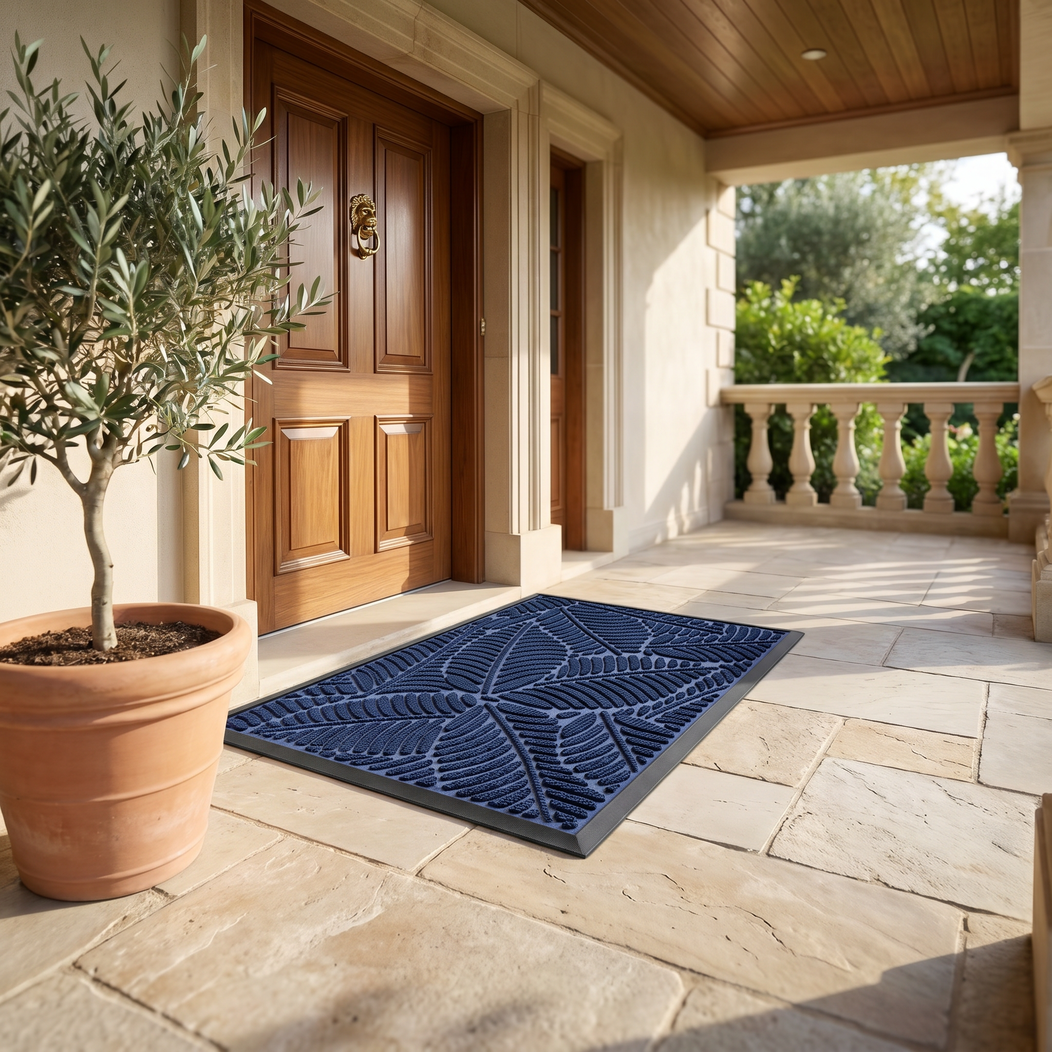 Foglia navy blue leaf doormat on an elegant covered porch