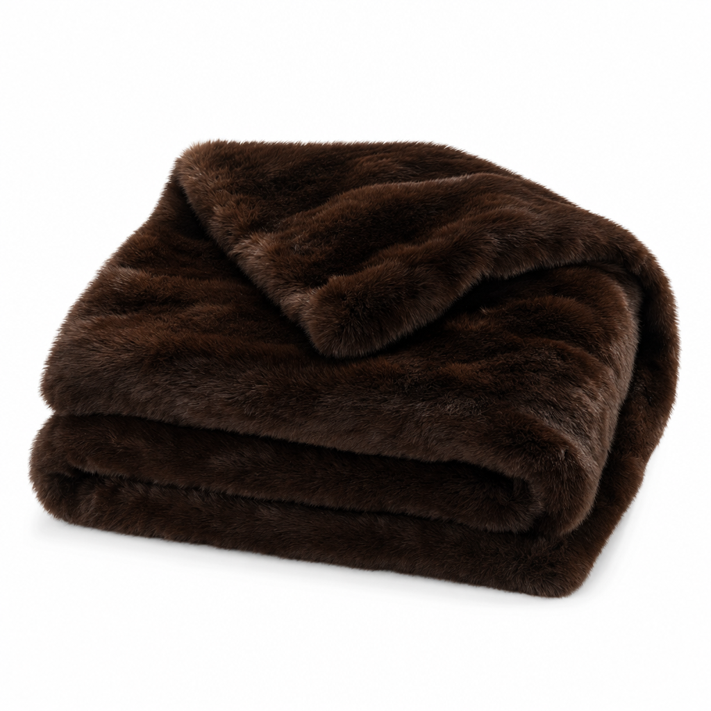 Carezza Sontuosa faux fur throw blanket in chocolate brown, folded on white