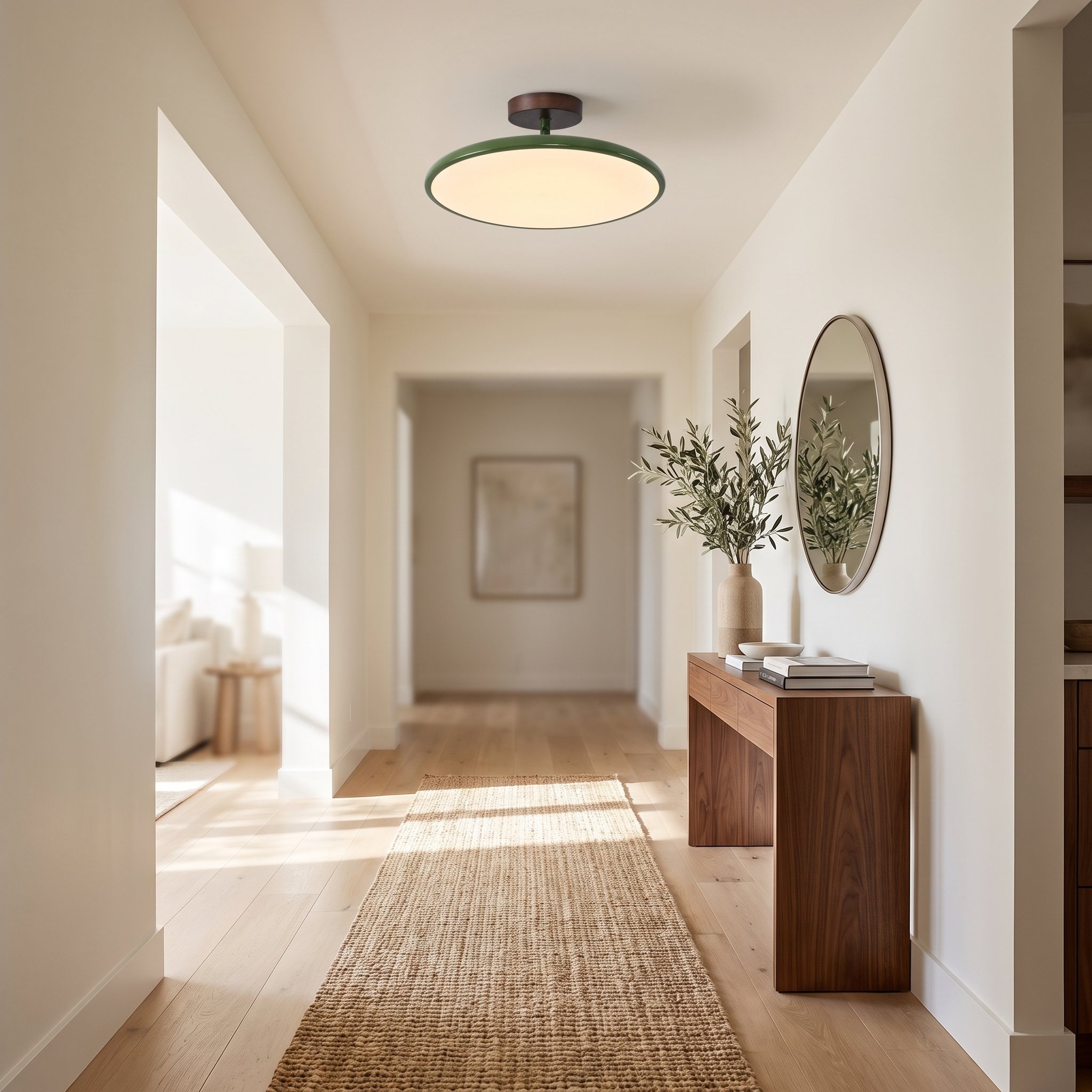 Green saucer ceiling light in a bright entry hallway