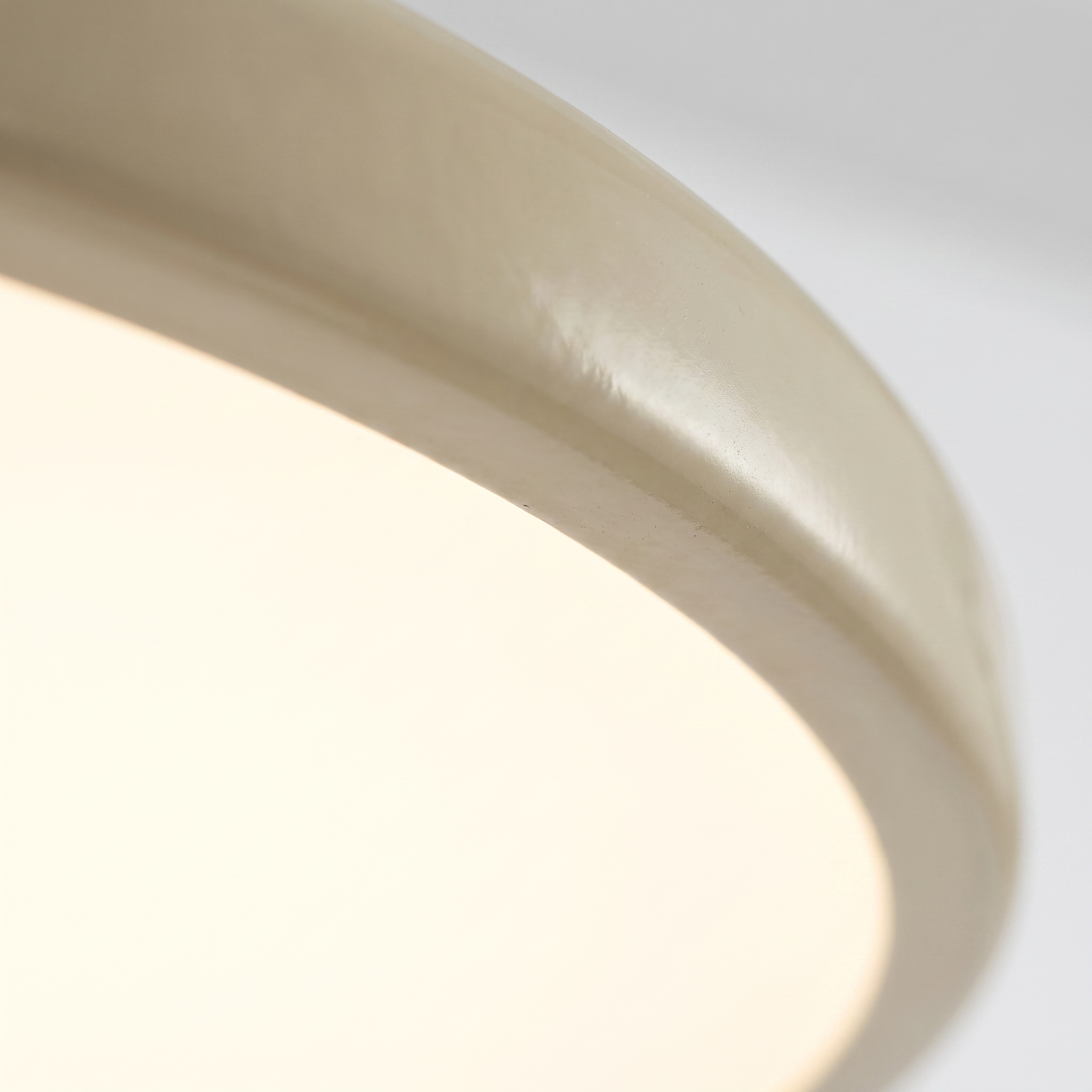Macro detail of the cream rim and glowing acrylic diffuser