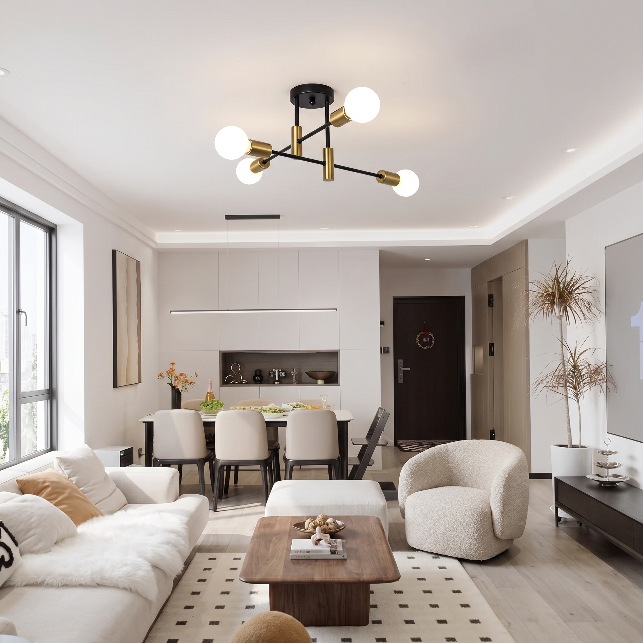 Black and gold sputnik ceiling light glowing above a modern living room