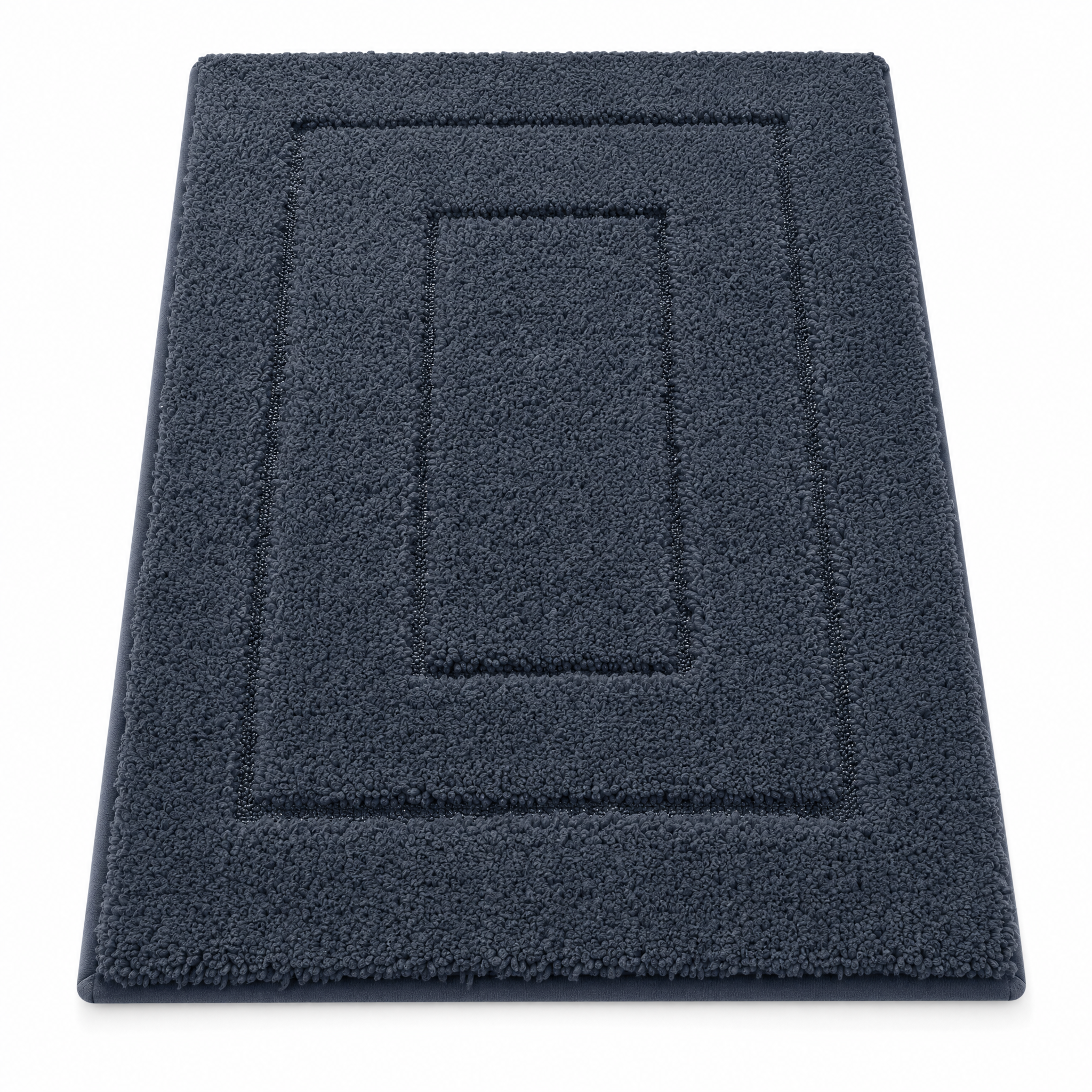 Navy plush bath mat on a white background