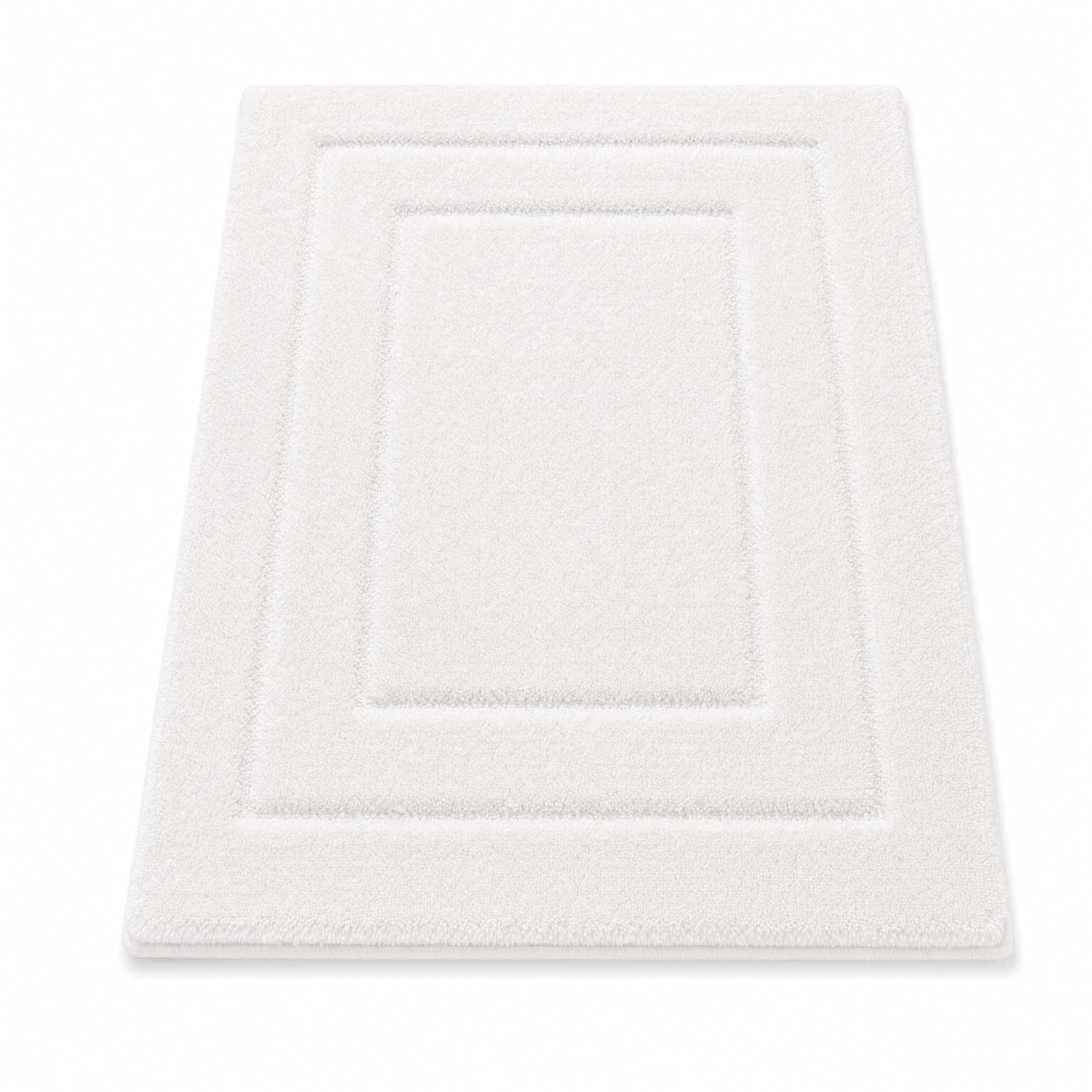 Ivory plush bath mat on a white background