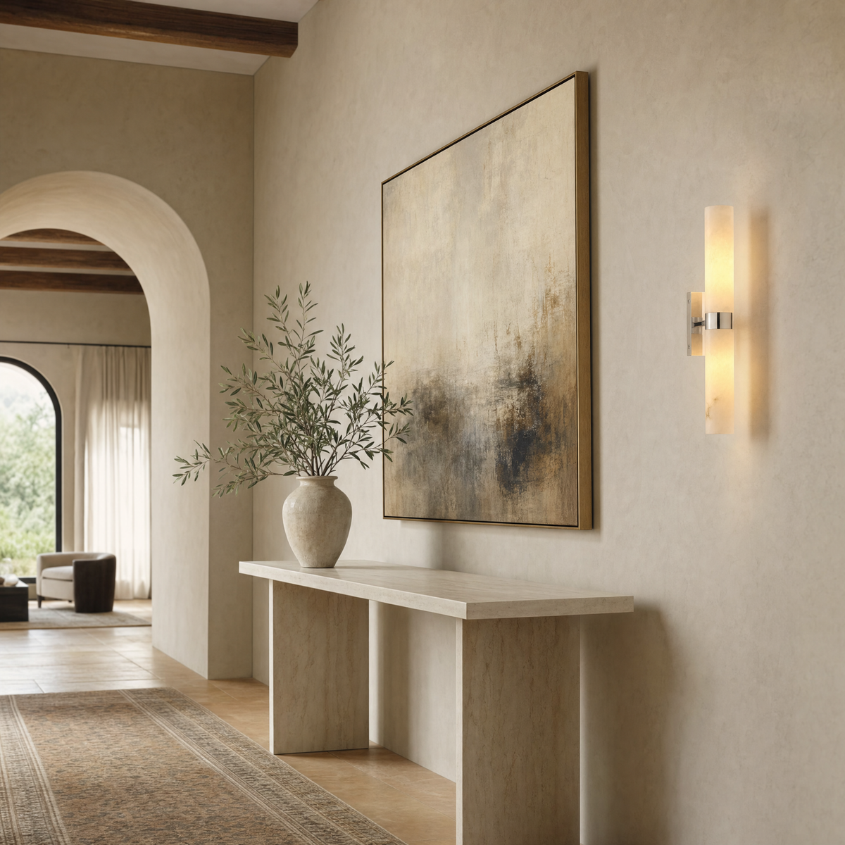 Alabaster tube sconce in polished nickel beside an abstract painting in a limewashed gallery hallway