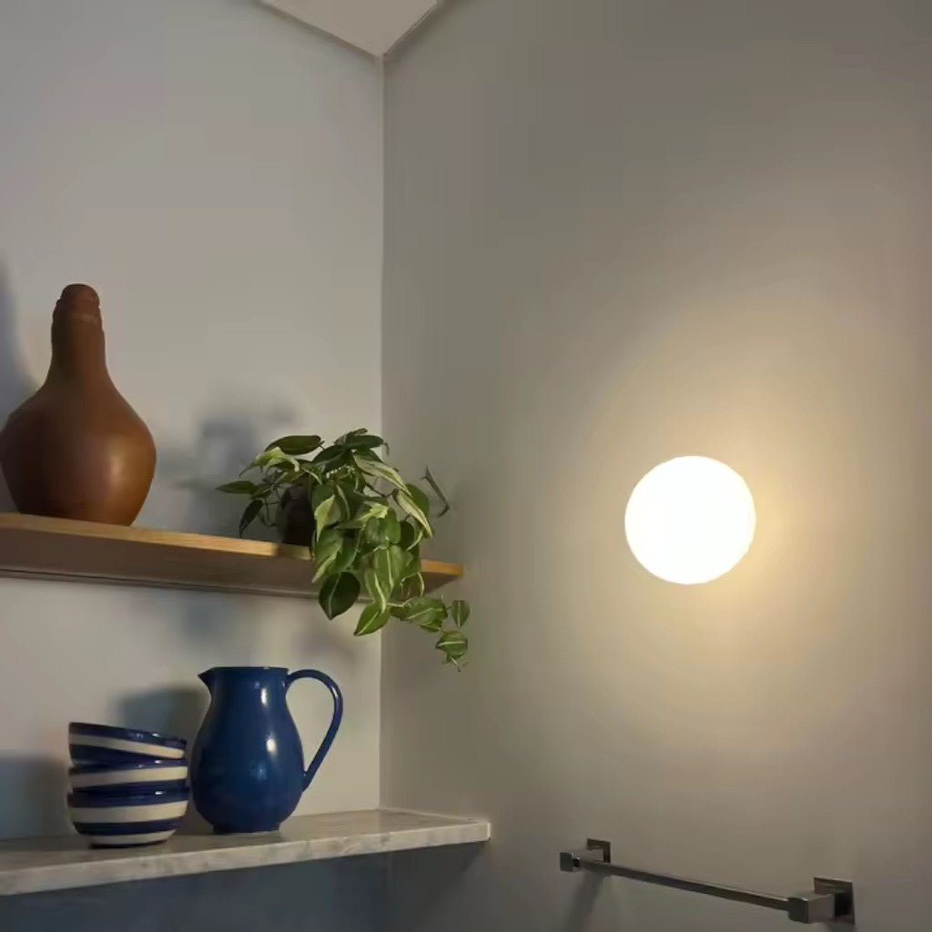 https://cdn.shopify.com/s/files/1/0655/0464/1076/files/japandi-minimalist-spherical-glass-wall-light-sconces-006_2.jpg?v=1773243018