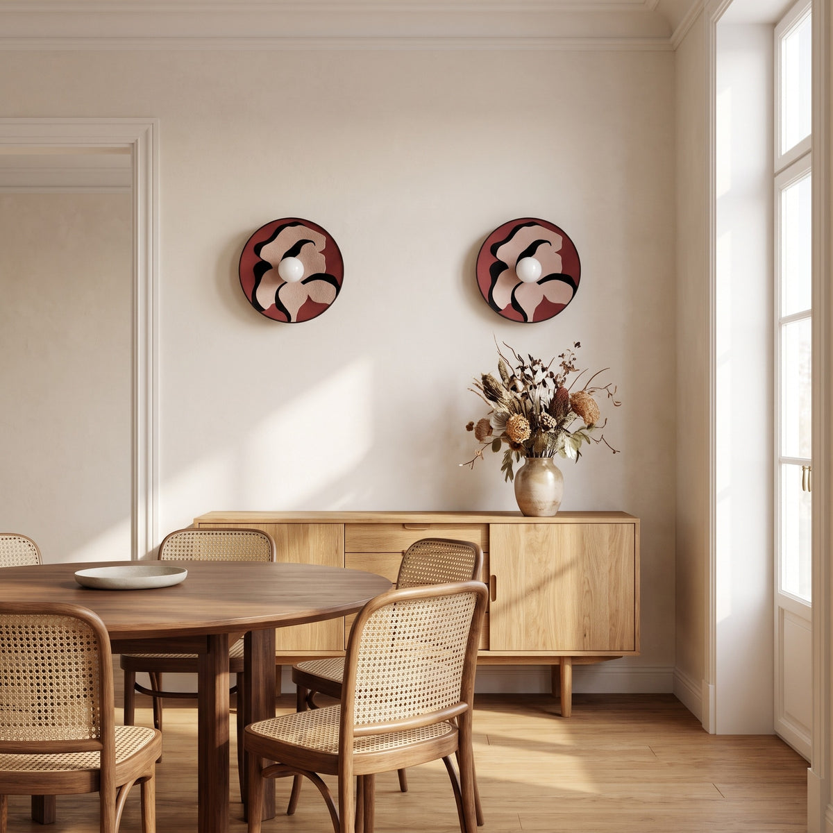 Pair of Luna Tessuta wall sconces in Bordeaux Bloom above an oak sideboard in a dining room