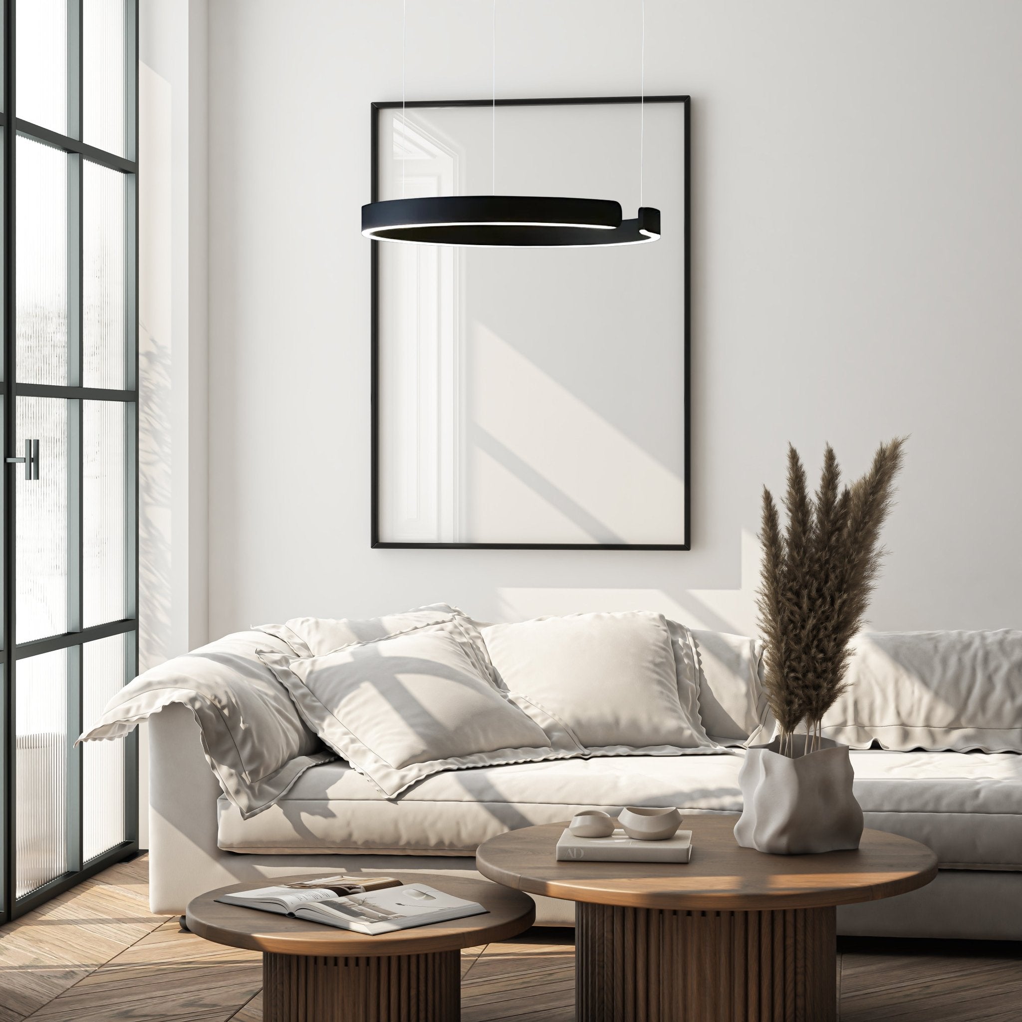 Black Orbita LED Ring Chandelier in a living room