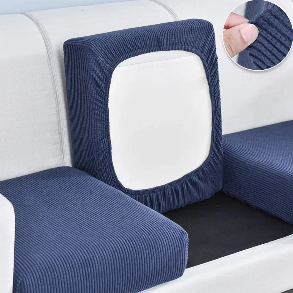 https://cdn.shopify.com/s/files/1/0655/0464/1076/files/pet-friendly-stretch-sofa-cover-washable-furniture-protector-154858.jpg?v=1750730722
