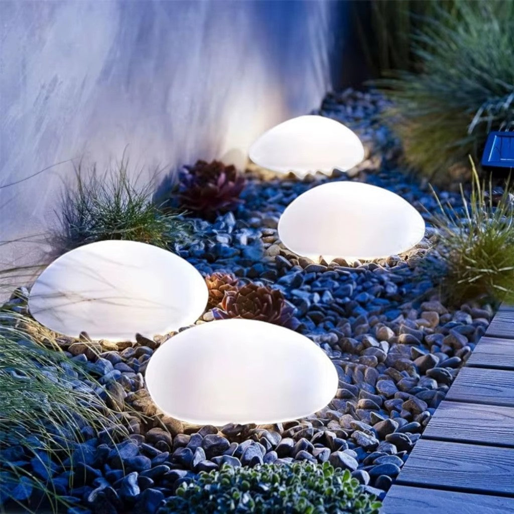 https://cdn.shopify.com/s/files/1/0655/0464/1076/files/solar-garden-pebble-outdoor-light-ip65-waterproof-auto-dusk-to-dawn_12.jpg?v=1778281560