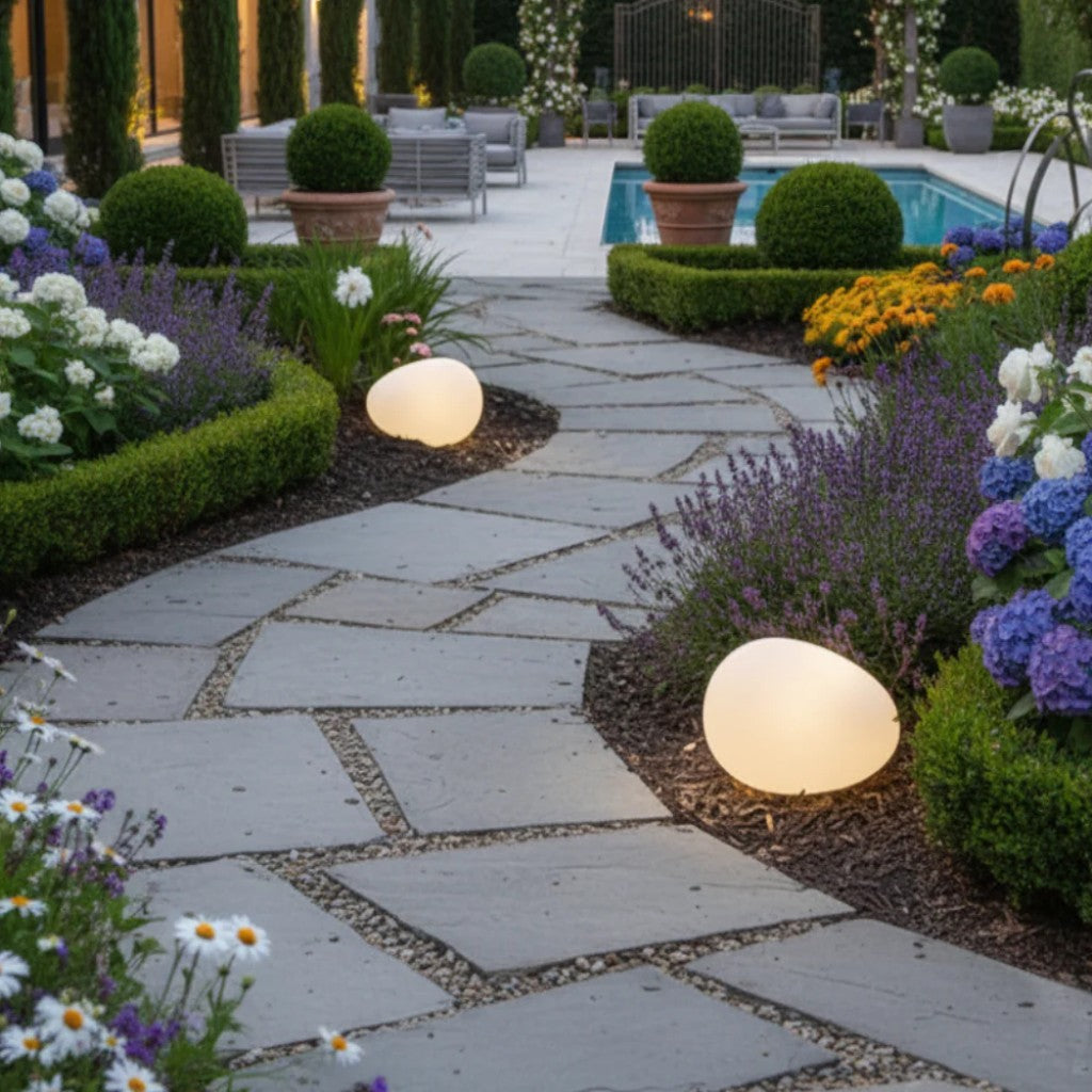 https://cdn.shopify.com/s/files/1/0655/0464/1076/files/solar-garden-pebble-outdoor-light-ip65-waterproof-auto-dusk-to-dawn_4.jpg?v=1778281560