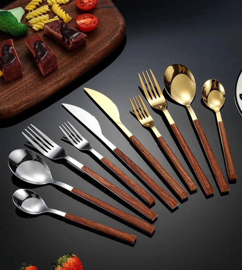 https://cdn.shopify.com/s/files/1/0655/0464/1076/files/stainless-steel-cutlery-set-with-wood-handle-435883.webp?v=1750730655