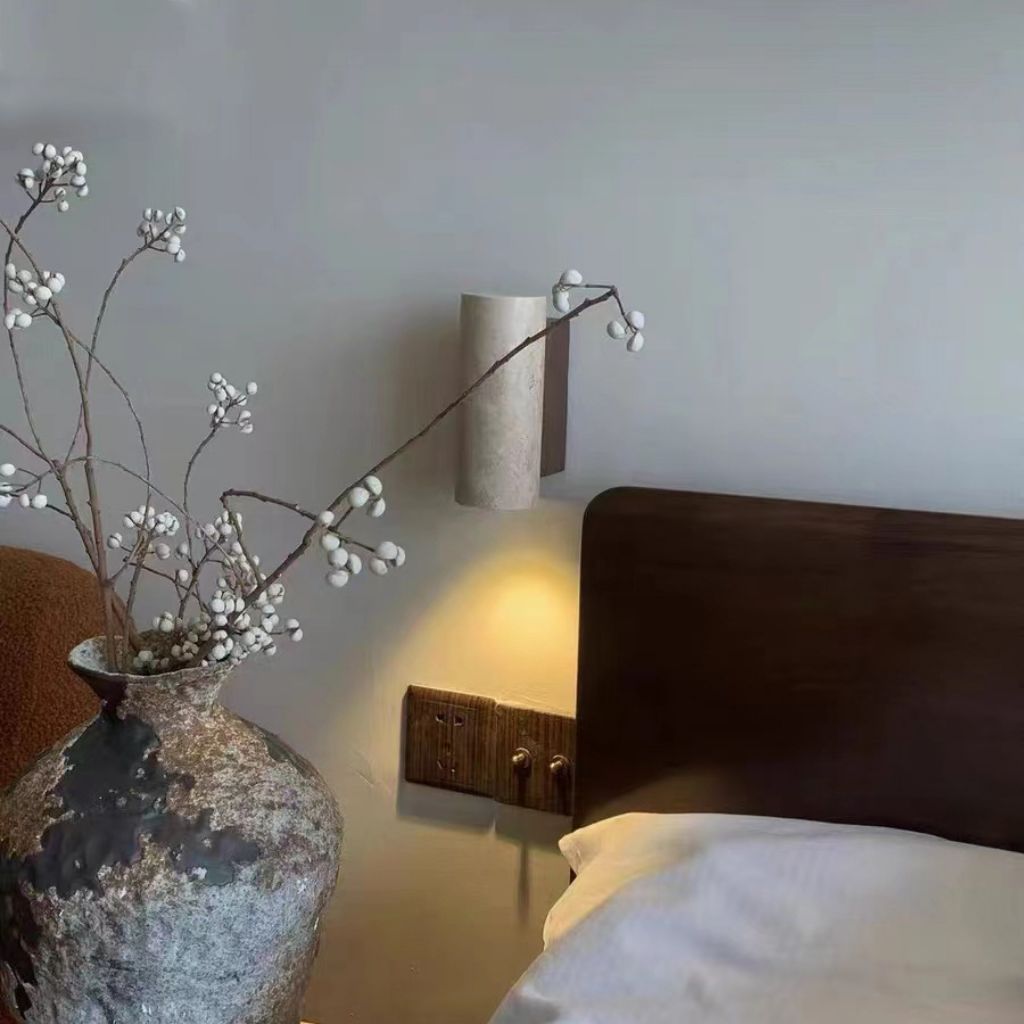 https://cdn.shopify.com/s/files/1/0655/0464/1076/files/stoneshine-wabi-sabi-travertine-wall-lamp-next-to-bed.jpg?v=1773354937