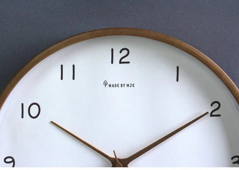 https://cdn.shopify.com/s/files/1/0655/0464/1076/files/timelesswood-solid-wood-analog-wall-clock-with-minimalist-design-322111.webp?v=1773243192